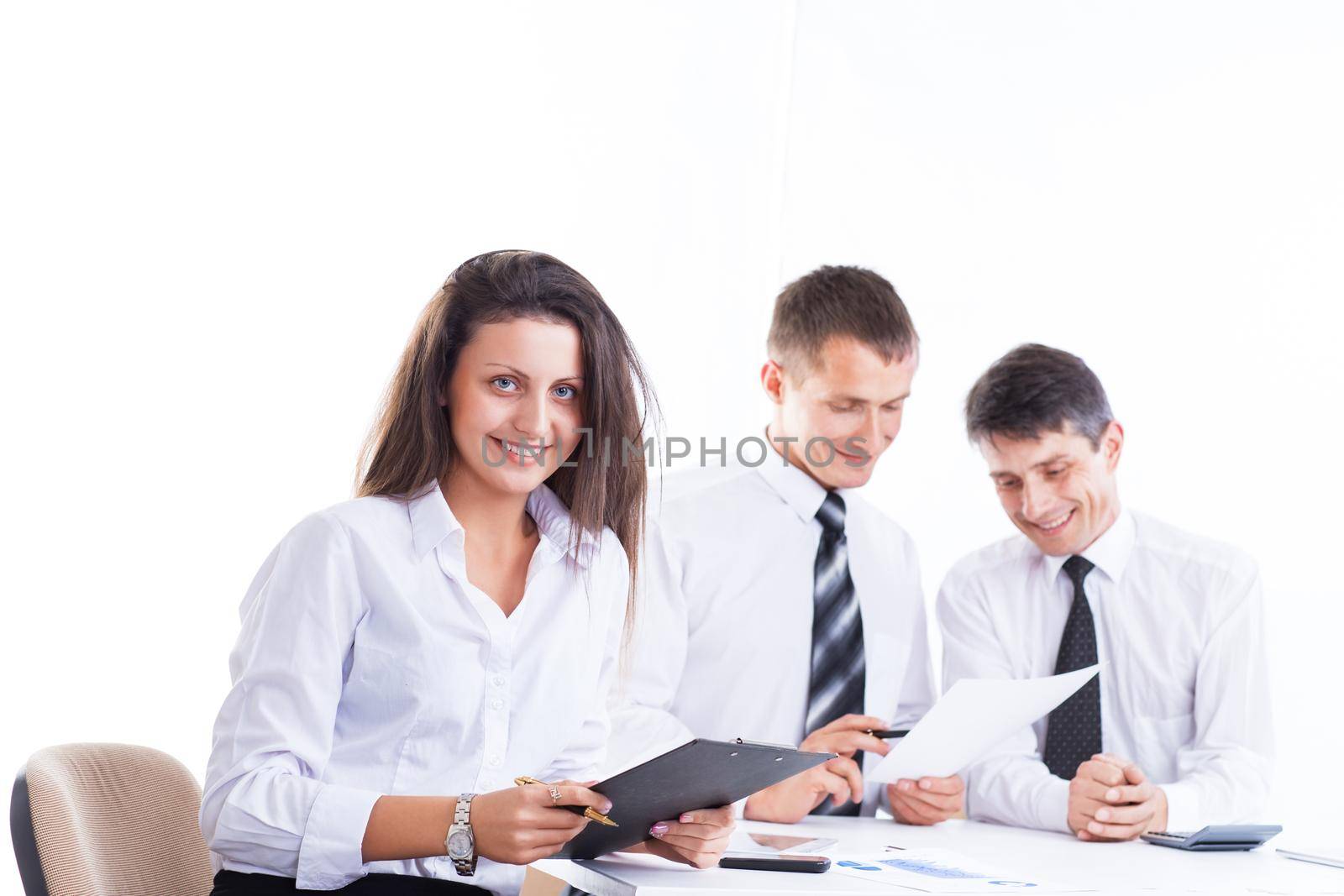 A group of businessmen discussing the policy of the company in the office.