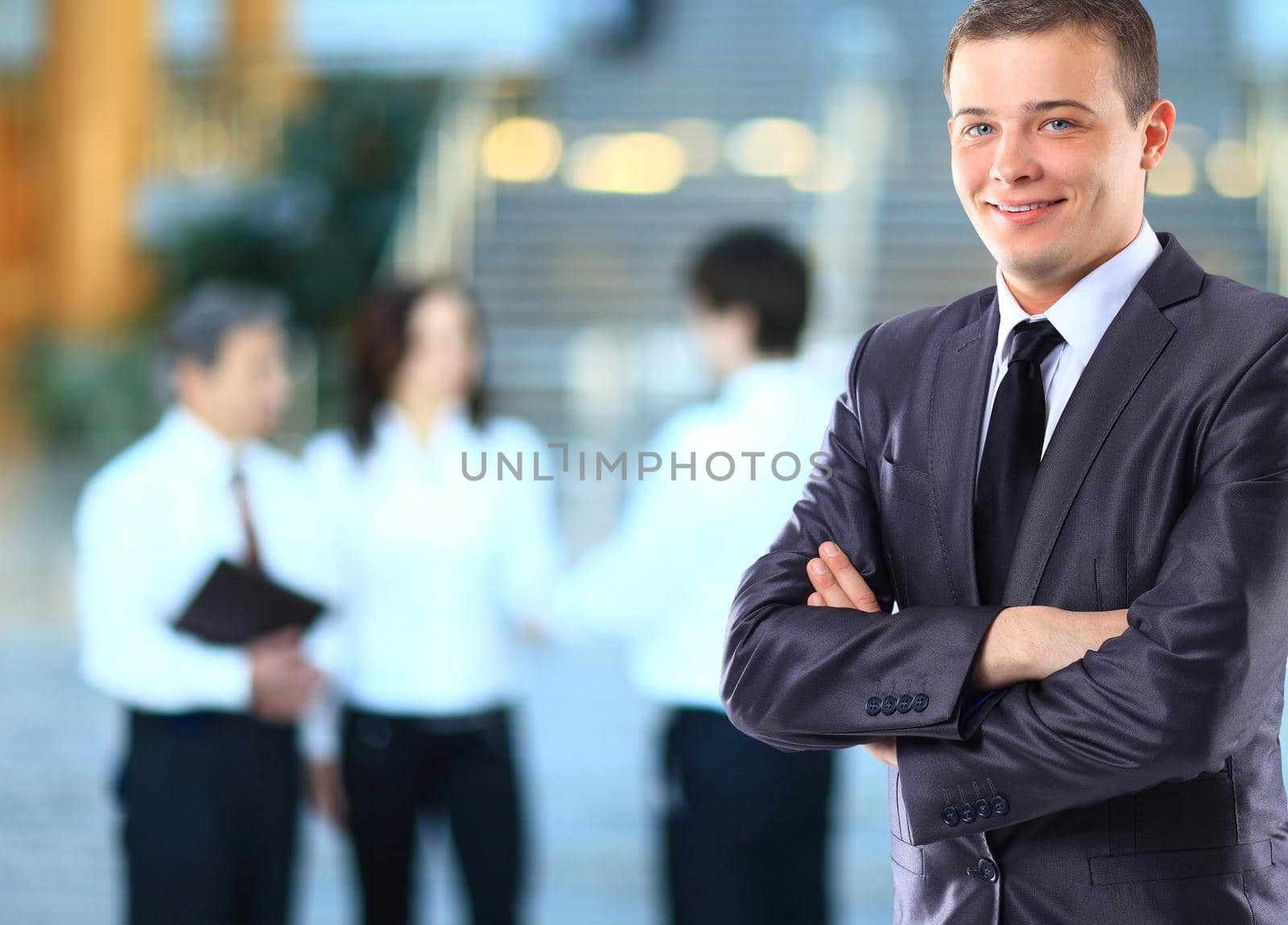 Businessman with coworkers.