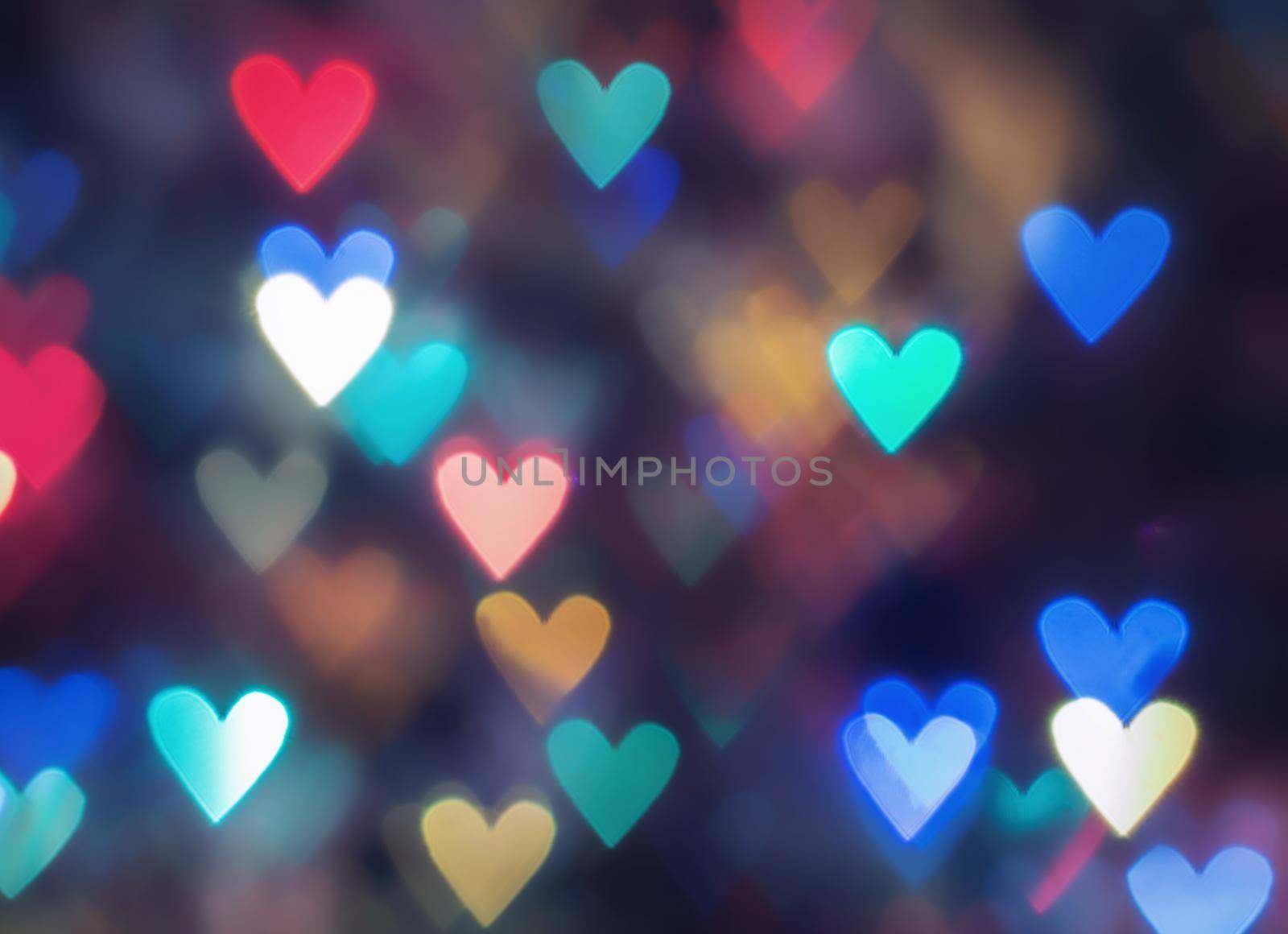 glowing colorful hearts in the form of bokeh. photo