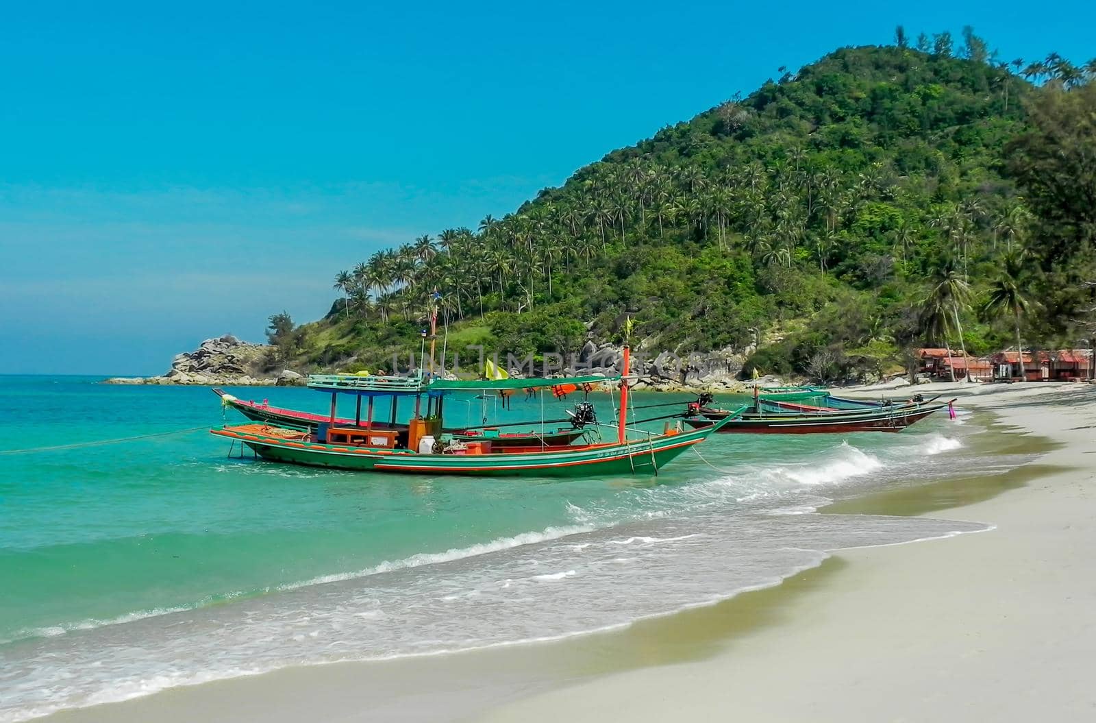Tropical beach, traditional long tail boats, Gulf of Thailand, Thailand.