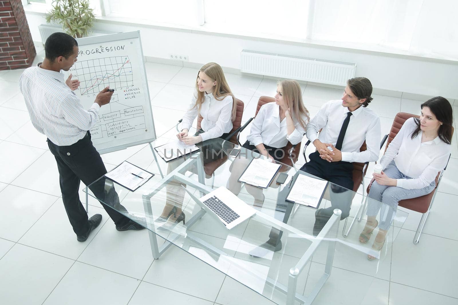 top view.business team at presentation of a new financial project.photo with copy space