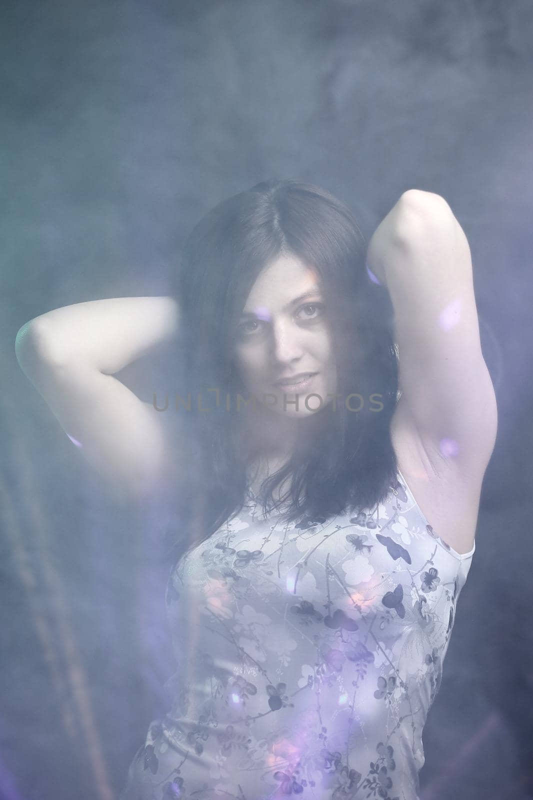 portrait of a pretty young woman. effect of clouds.isolated