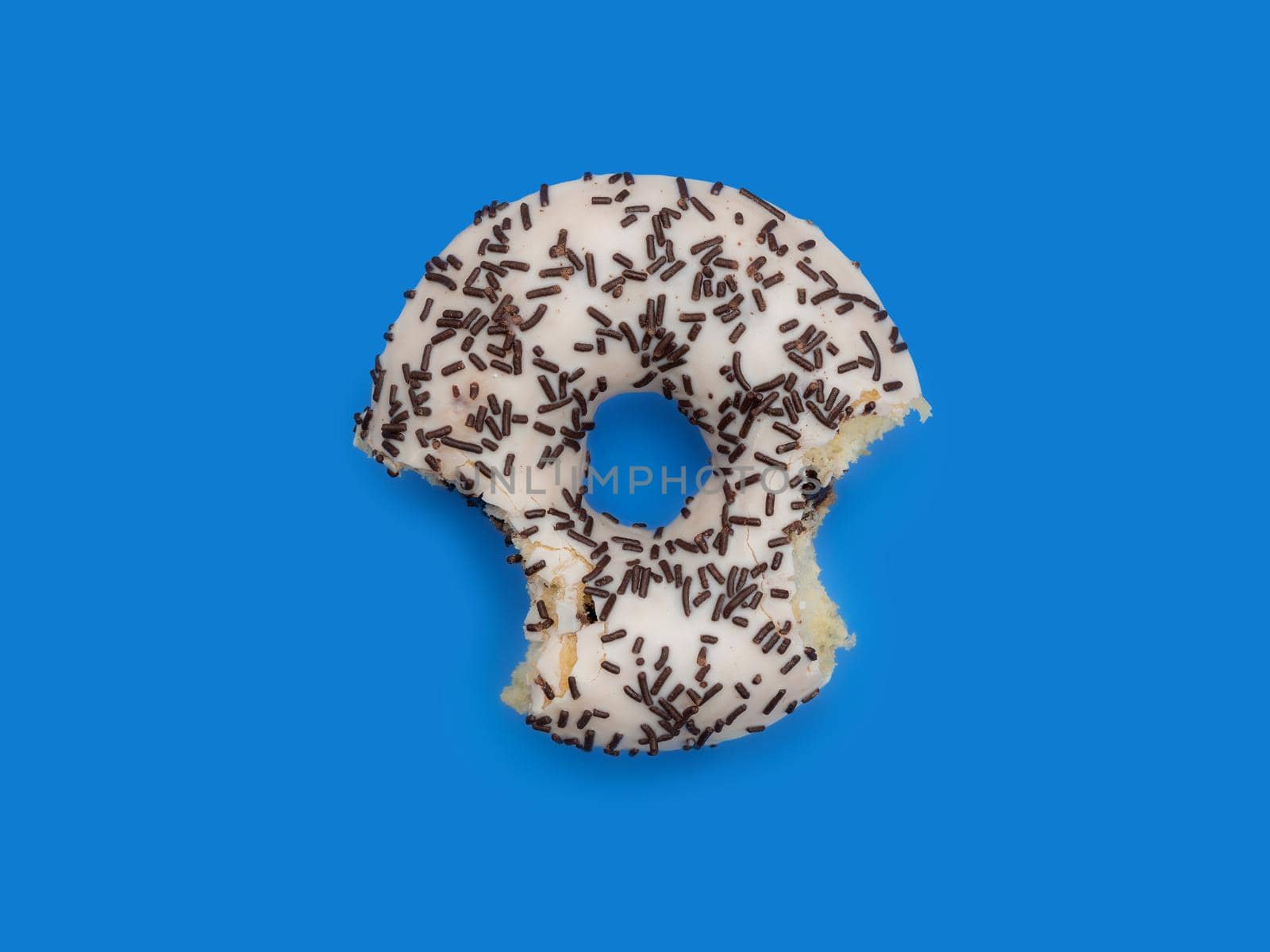 Donuts with icing on a pastel blue background. Sweet donuts. photo