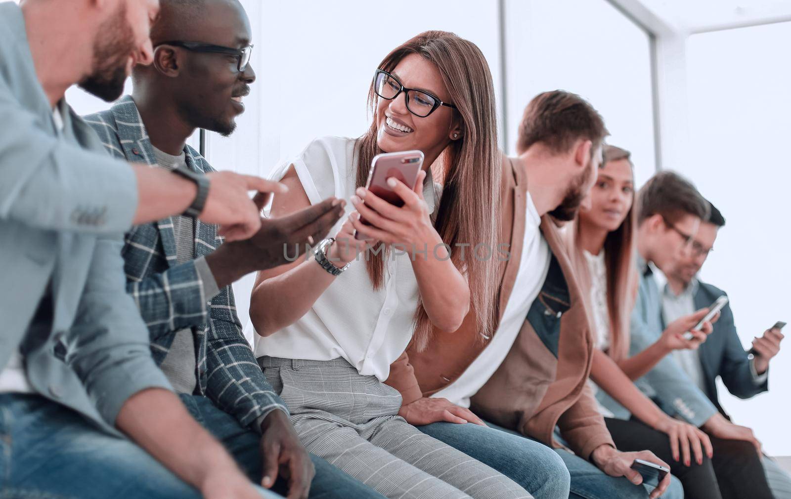 group of young people with smartphones.people and technology