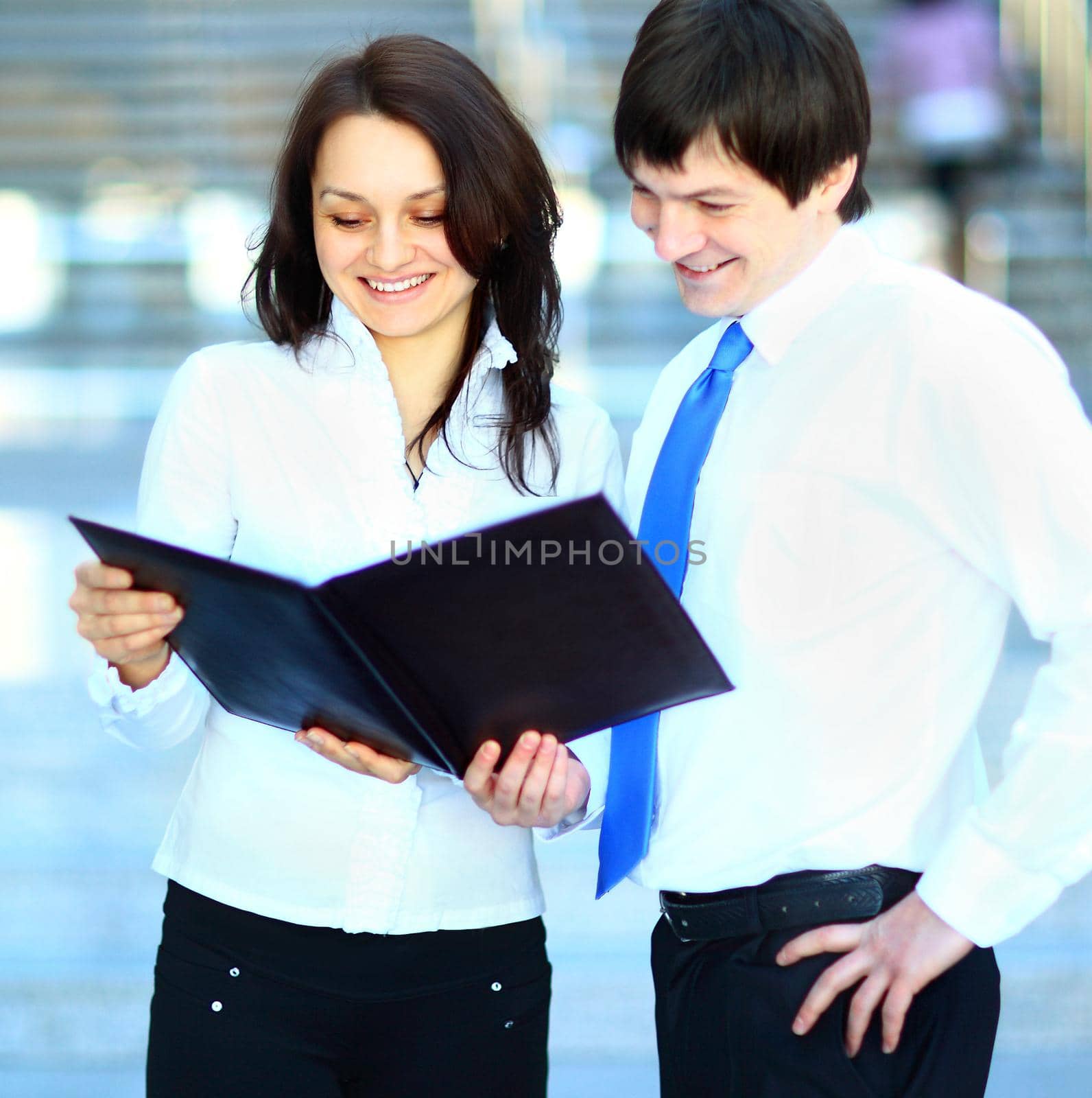 Image of smart boss explaining to colleague business idea