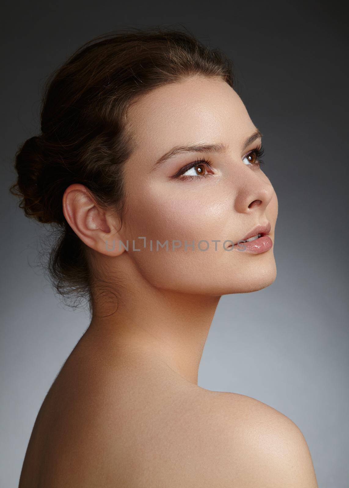 Beautiful face of young woman. Skincare, wellness, spa. Clean soft skin, healthy fresh look. Natural daily makeup by MarinaFrost