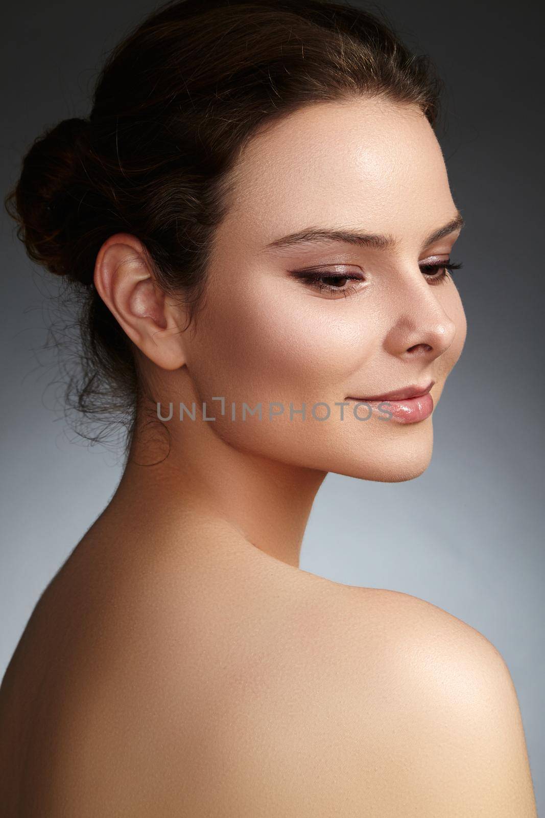 Beautiful face of young woman. Skincare, wellness, spa. Clean soft skin, healthy fresh look. Natural daily makeup by MarinaFrost