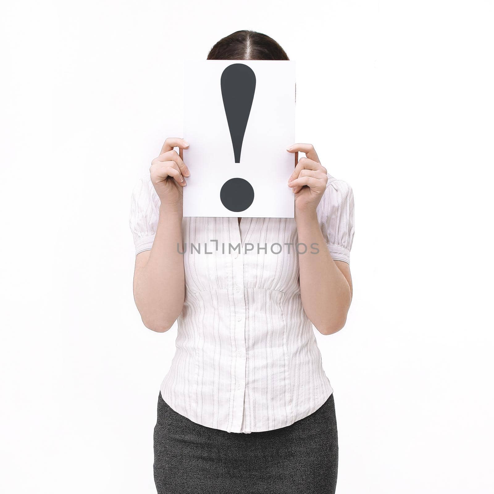 modern young woman showing an exclamation mark . isolated on white .photo with copy space