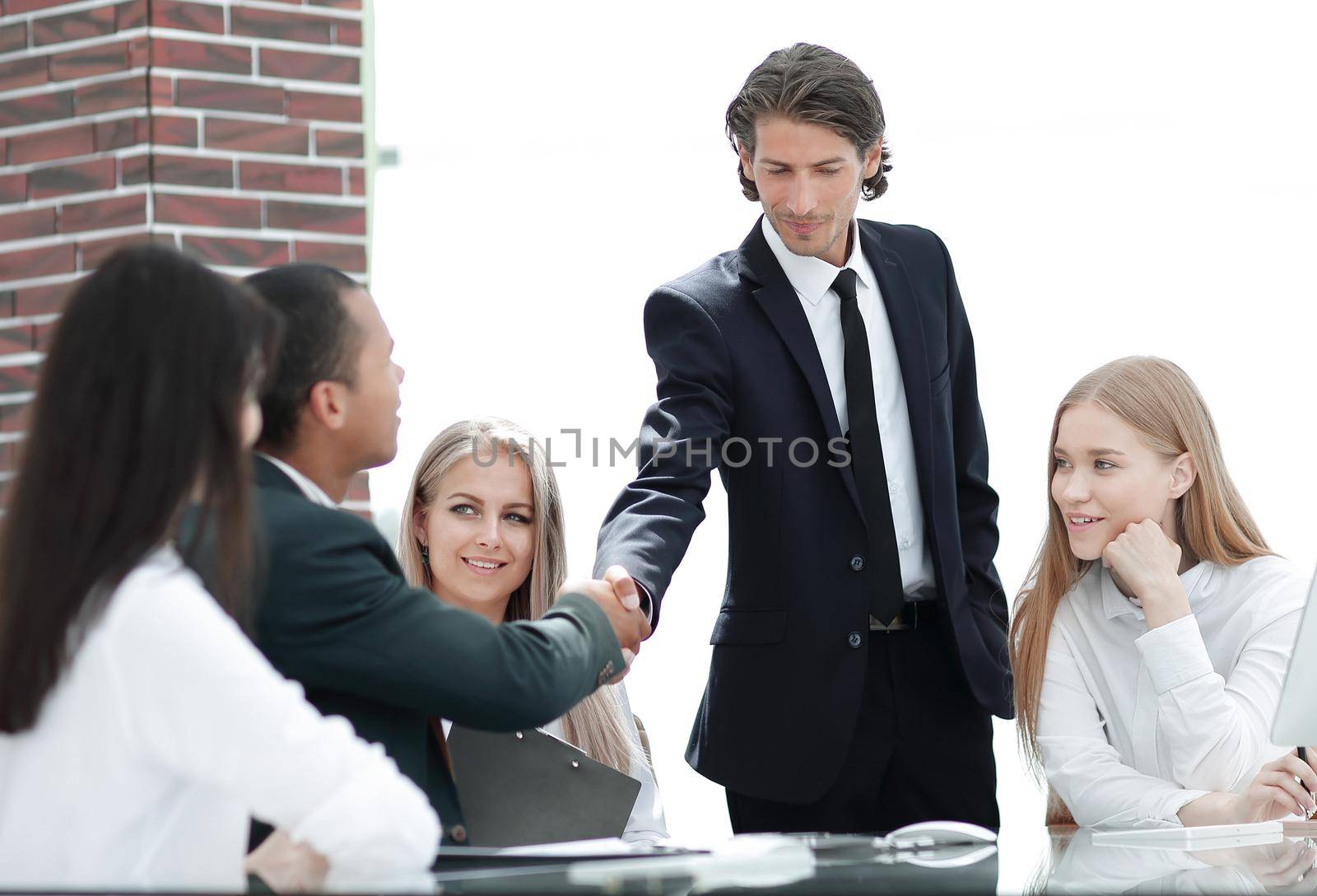 handshake Manager and customer in a modern office.photo with copy space