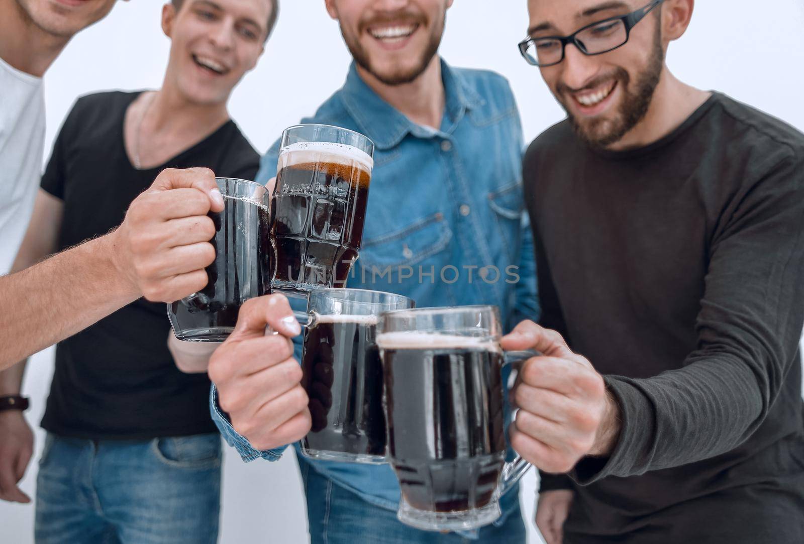 Joyful people holding big beer mug full of beer and looking at camera, isolated on white background