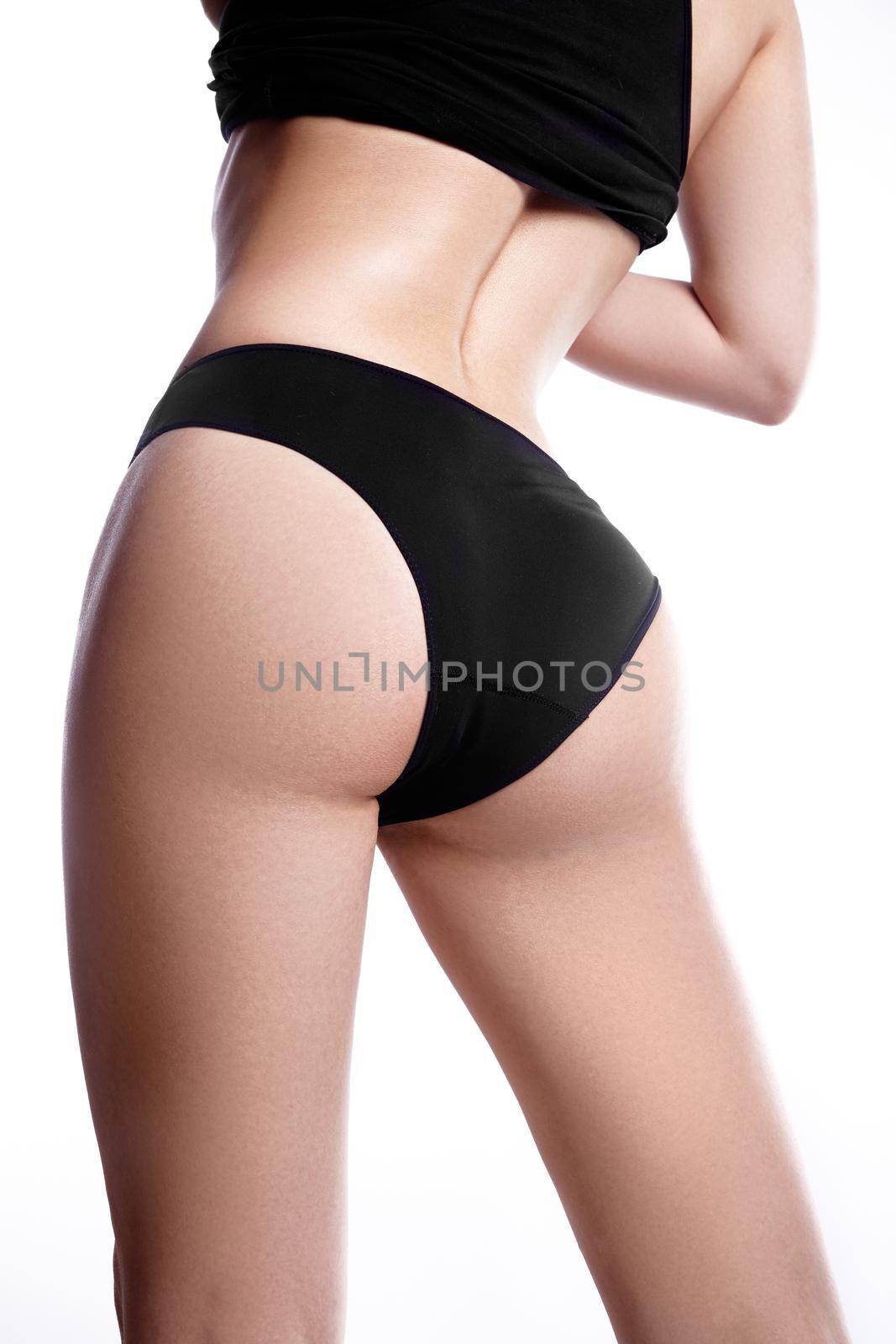 Beautiful part of female slim body. Beauty part of female body. Woman's shape with clean skin. Diet and fitness.Healthy lifestyle. Ideal waist, flat stomack, perfect buttocks and legs, sexy back.