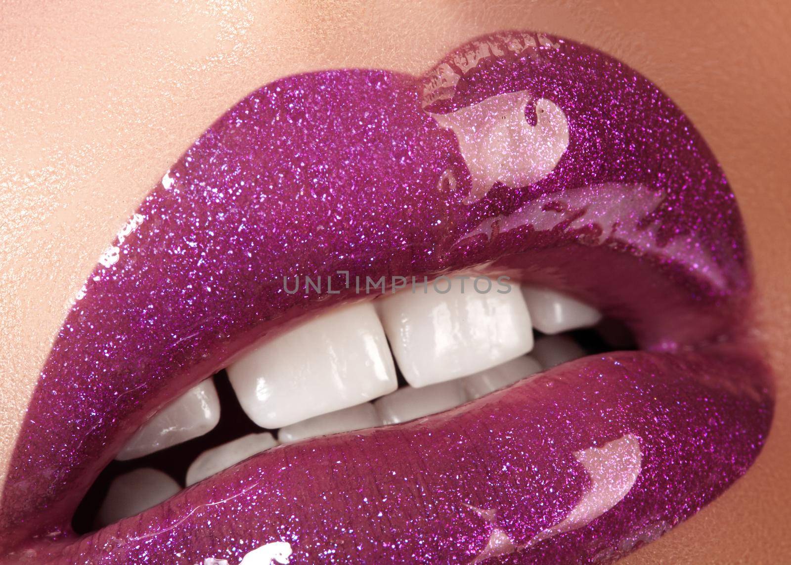Glamour Magenta Gloss Lip Make-up. Fashion Makeup Beauty Shot. Close-up Female Sexy Full Lips with Celebrate Pink Gloss.