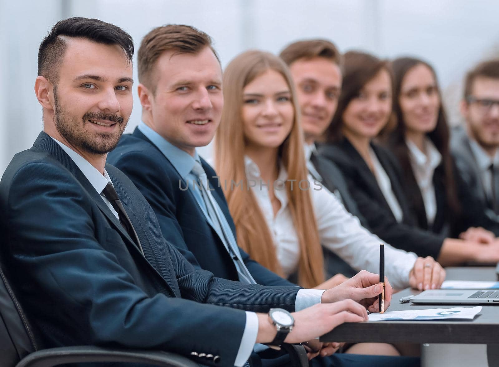 working meeting.business team sitting at table