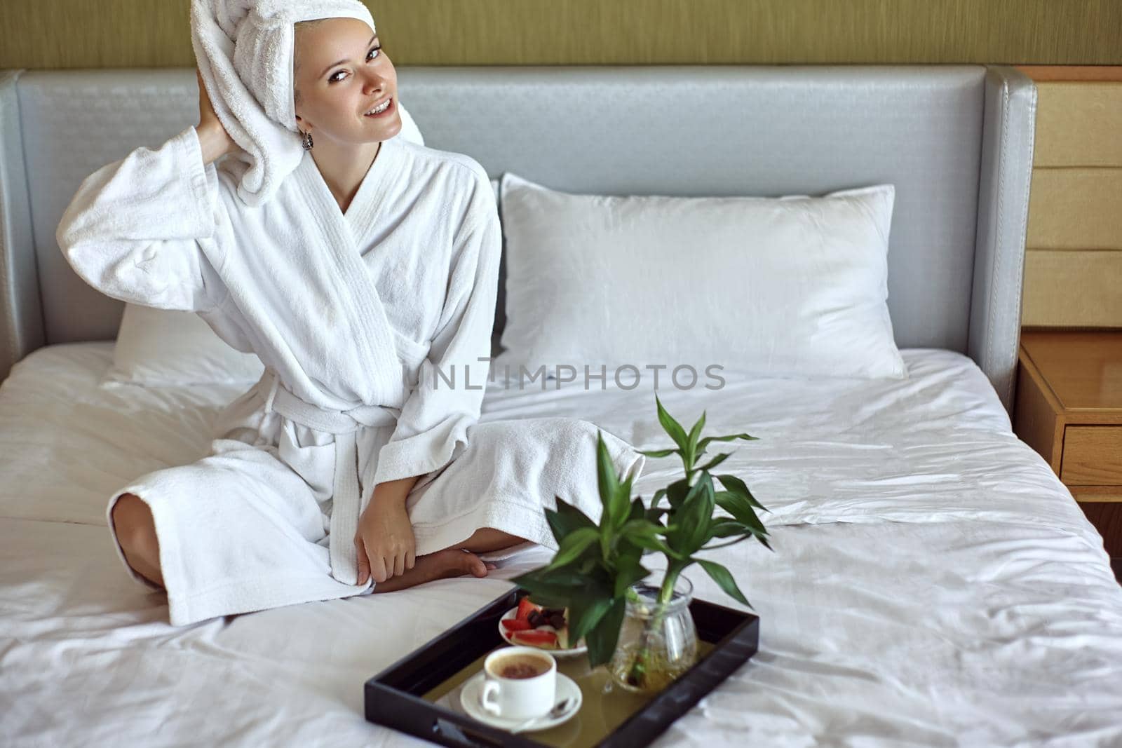 Beautiful Luxury Life. Breakfast. Happy Girl with a Cup of Coffee. Home Style Relaxation Woman Wearing Bathrobe and Towel after Shower. Spa Good Morning.