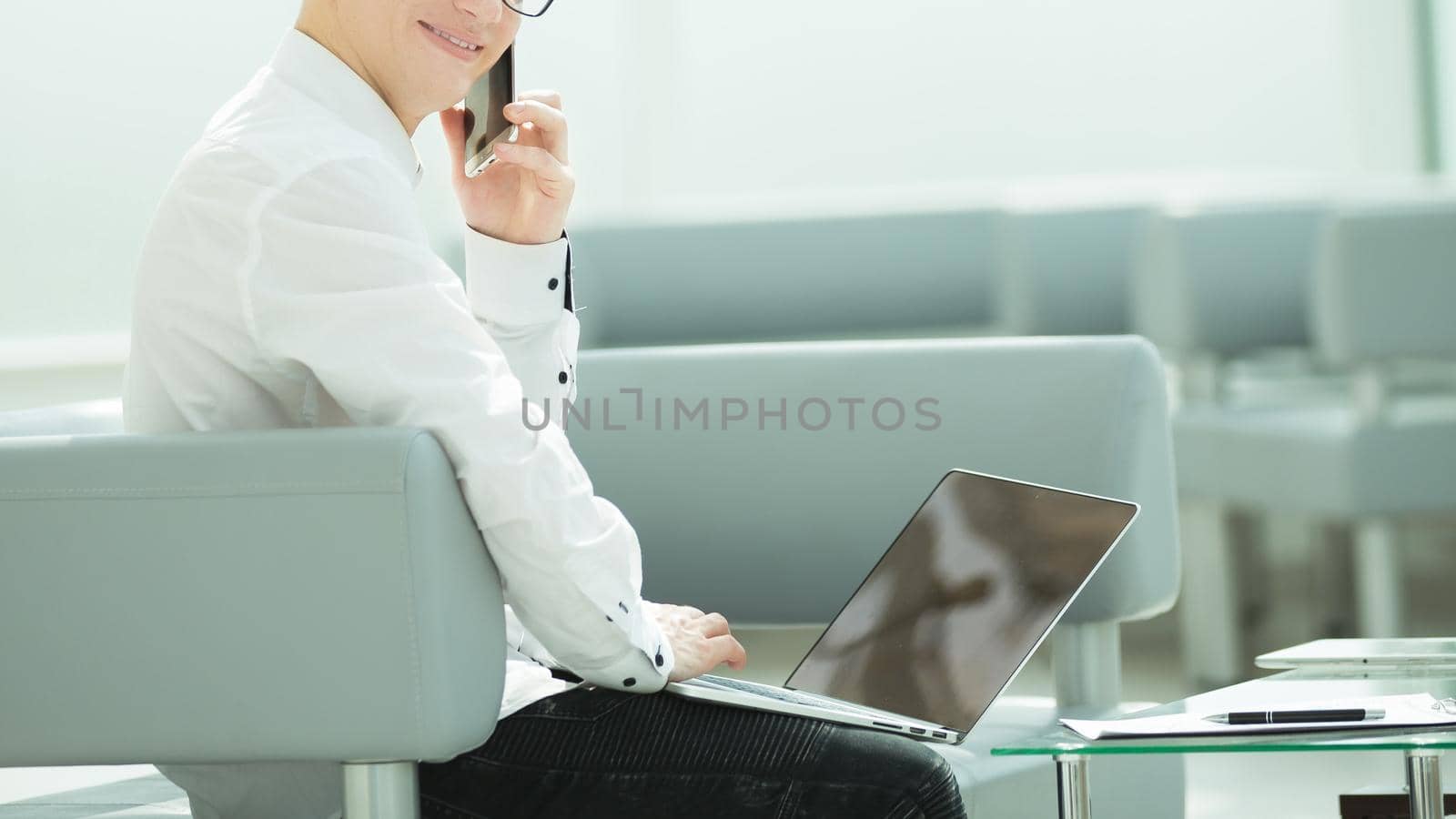 young businessman in the workplace in his office . people and technology