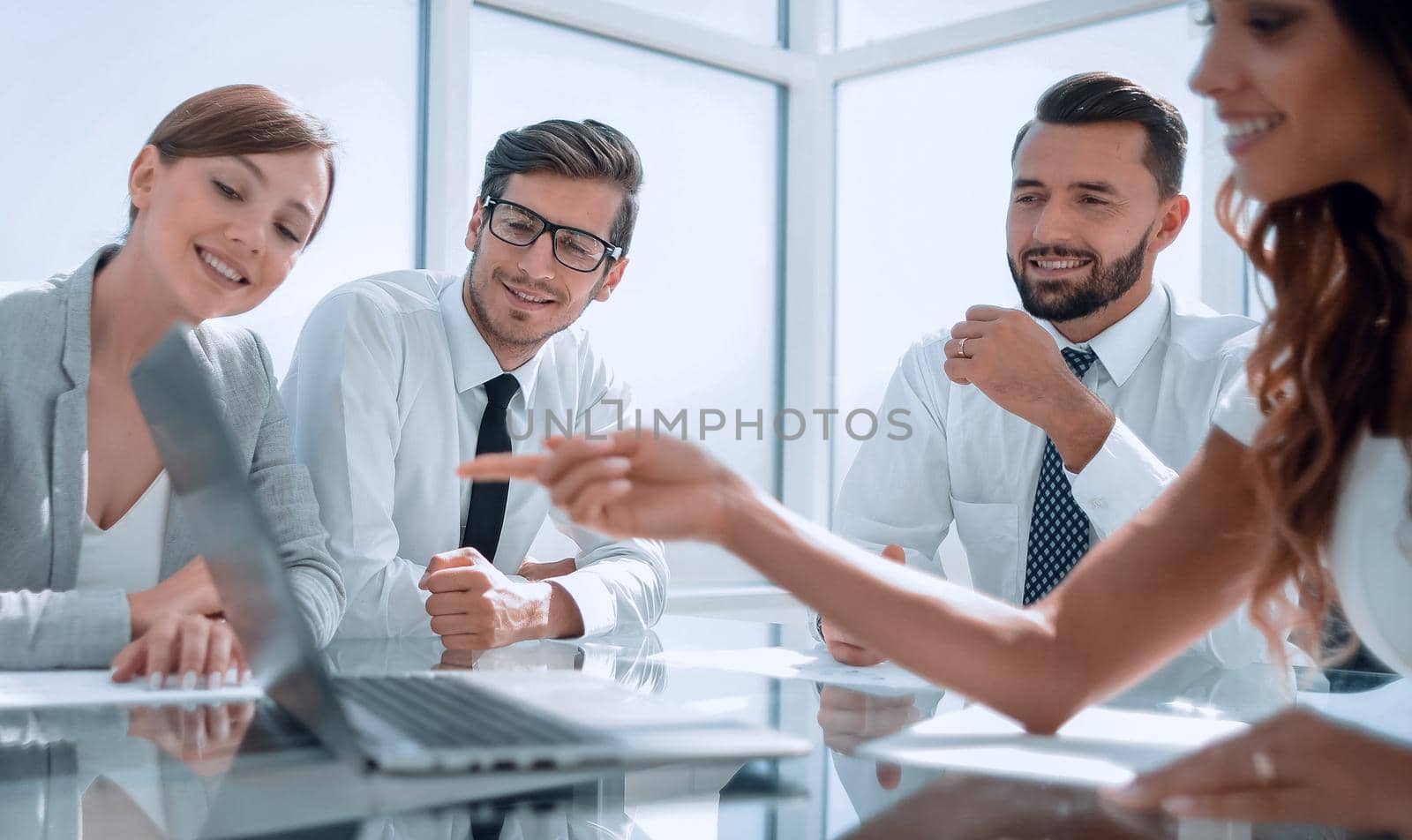 smiling business team at the Desk. office weekdays