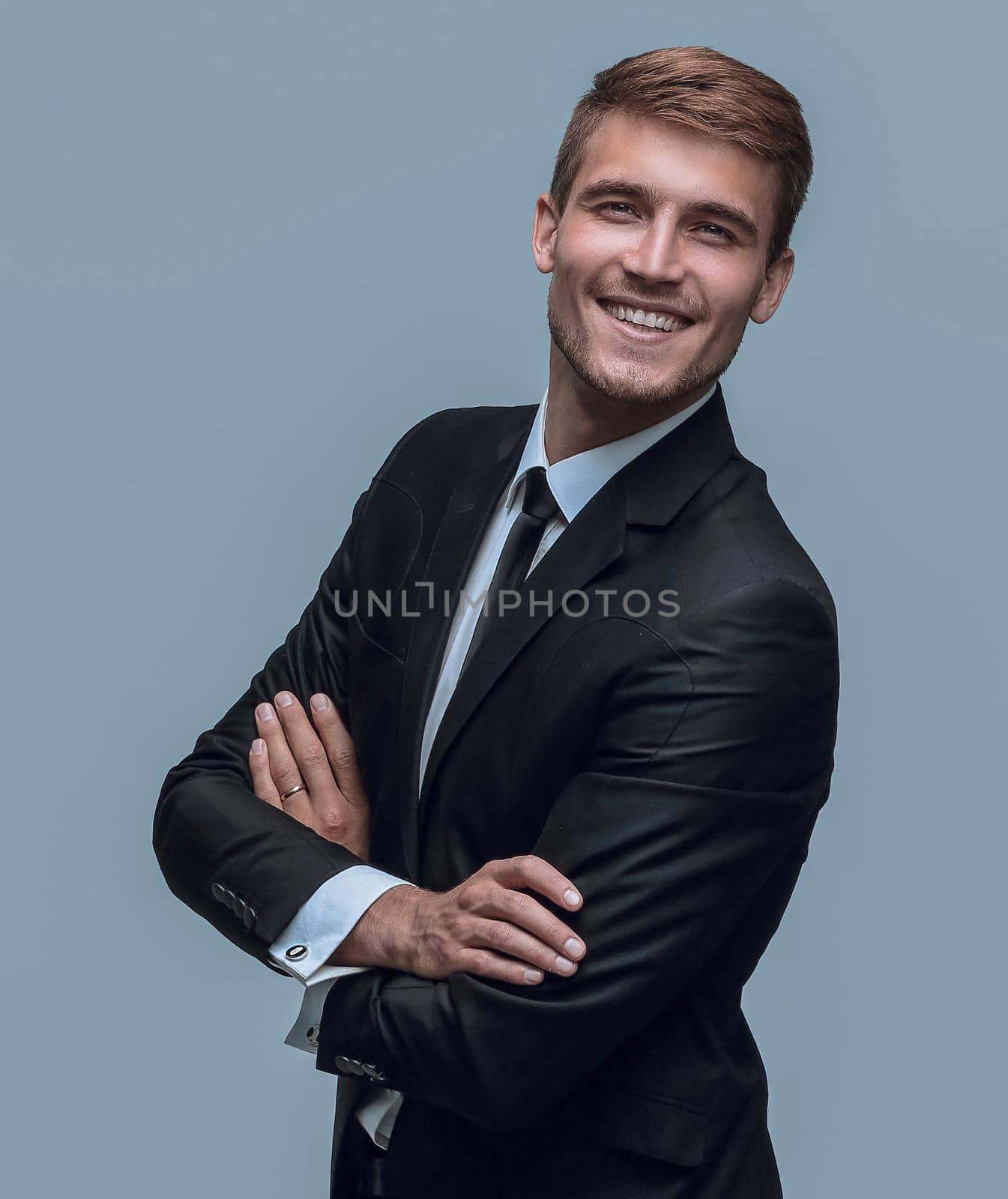 portrait of smiling successful businessman.isolated on a light background.