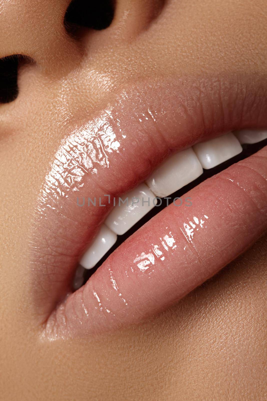 Closeup plump Lips. Lip Care, Augmentation, Fillers. Macro photo with Face detail. Natural shape with perfect contour. Close-up perfect natural lip makeup beautiful female mouth. Plump sexy full lips