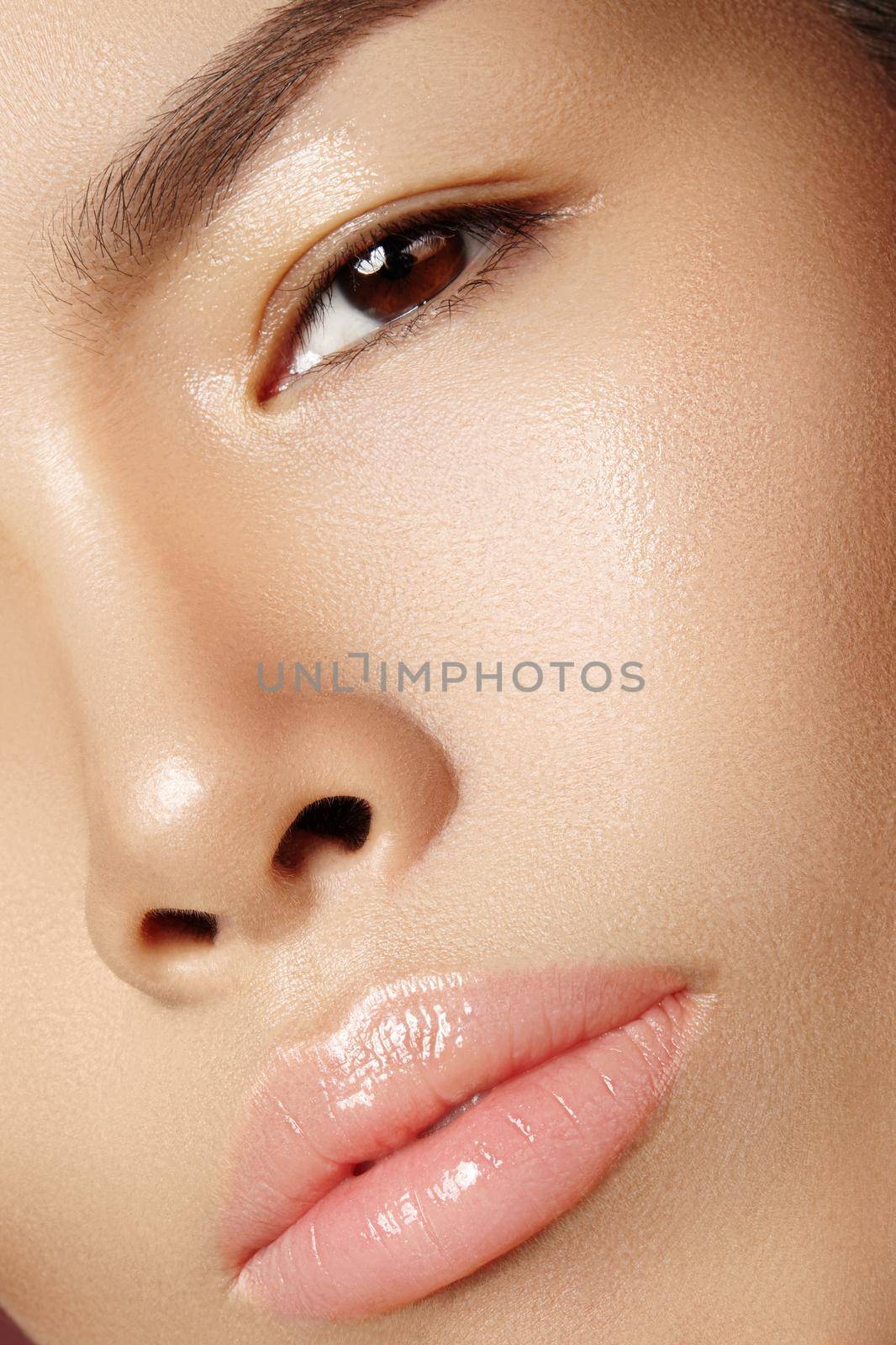 Beautiful asian woman with fresh daily makeup. Vietnamese beauty girl in spa treatment. Close-up with Clean Skin on her Face