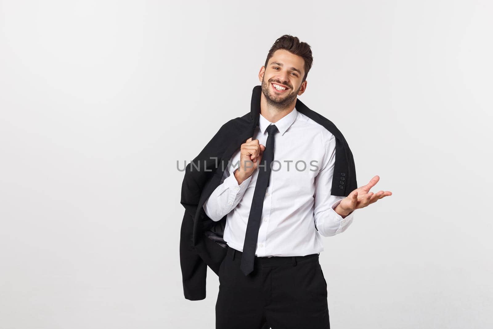 business and office concept - handsome smart buisnessman looking to camera. Isolated over white background. by Benzoix