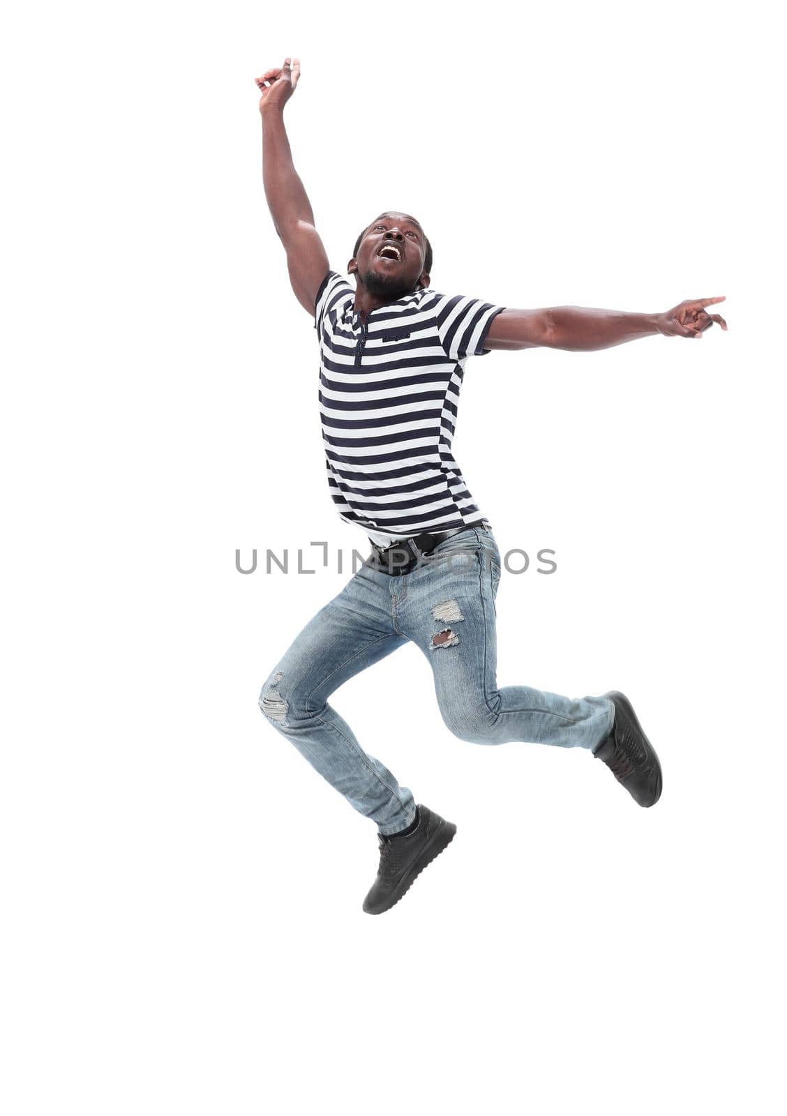 in full growth. very happy guy in casual clothes . isolated on white background