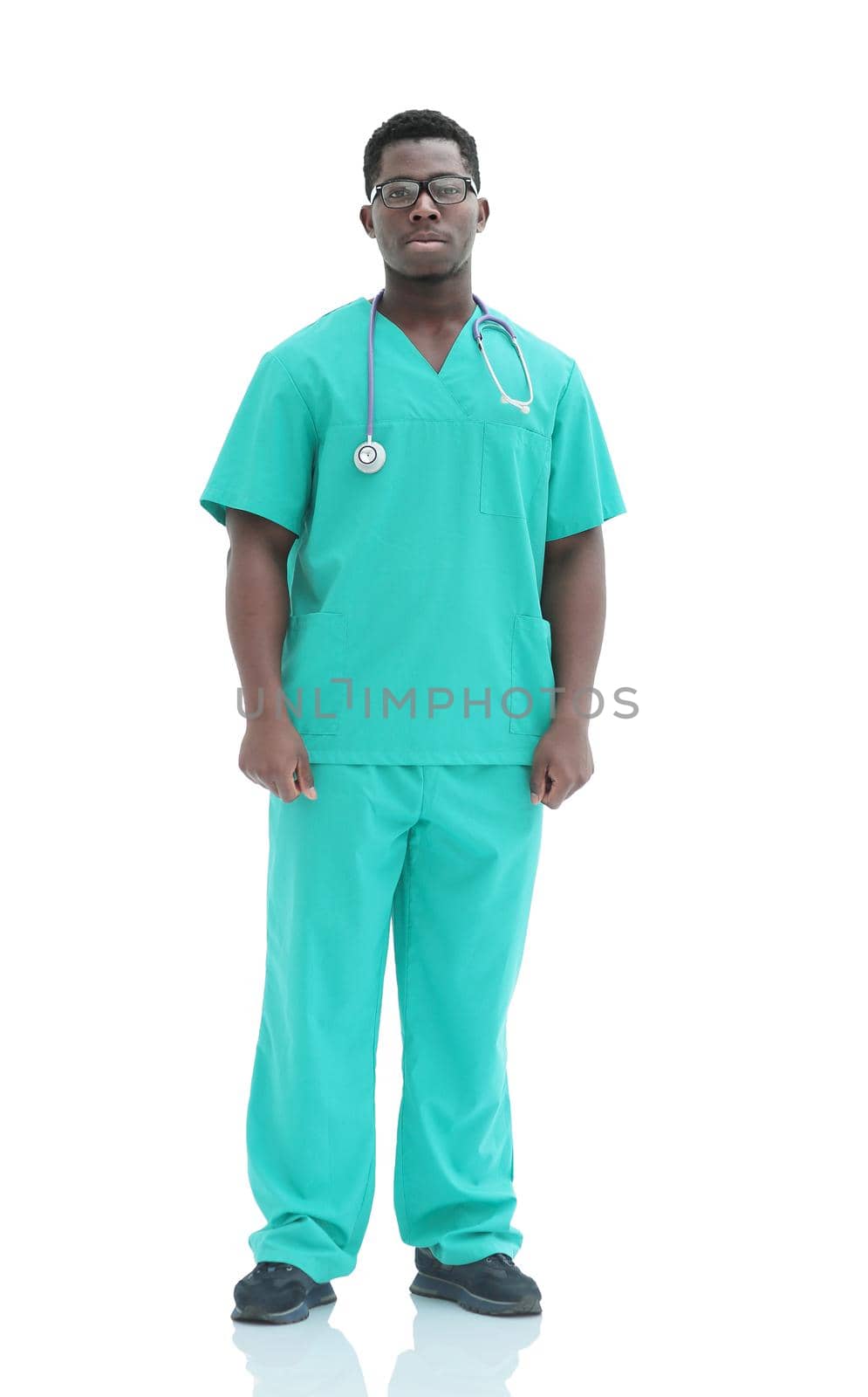 in full growth. smiling doctor in blue uniform. by asdf
