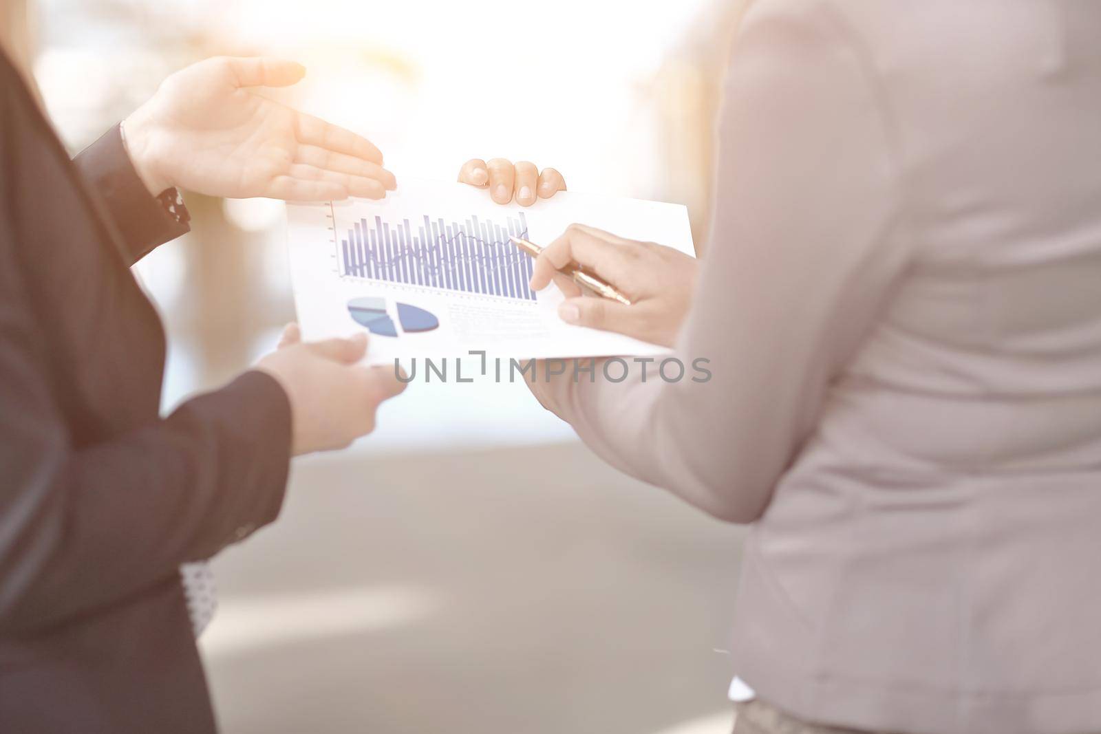 close up. managers discussing the financial profit of the company.