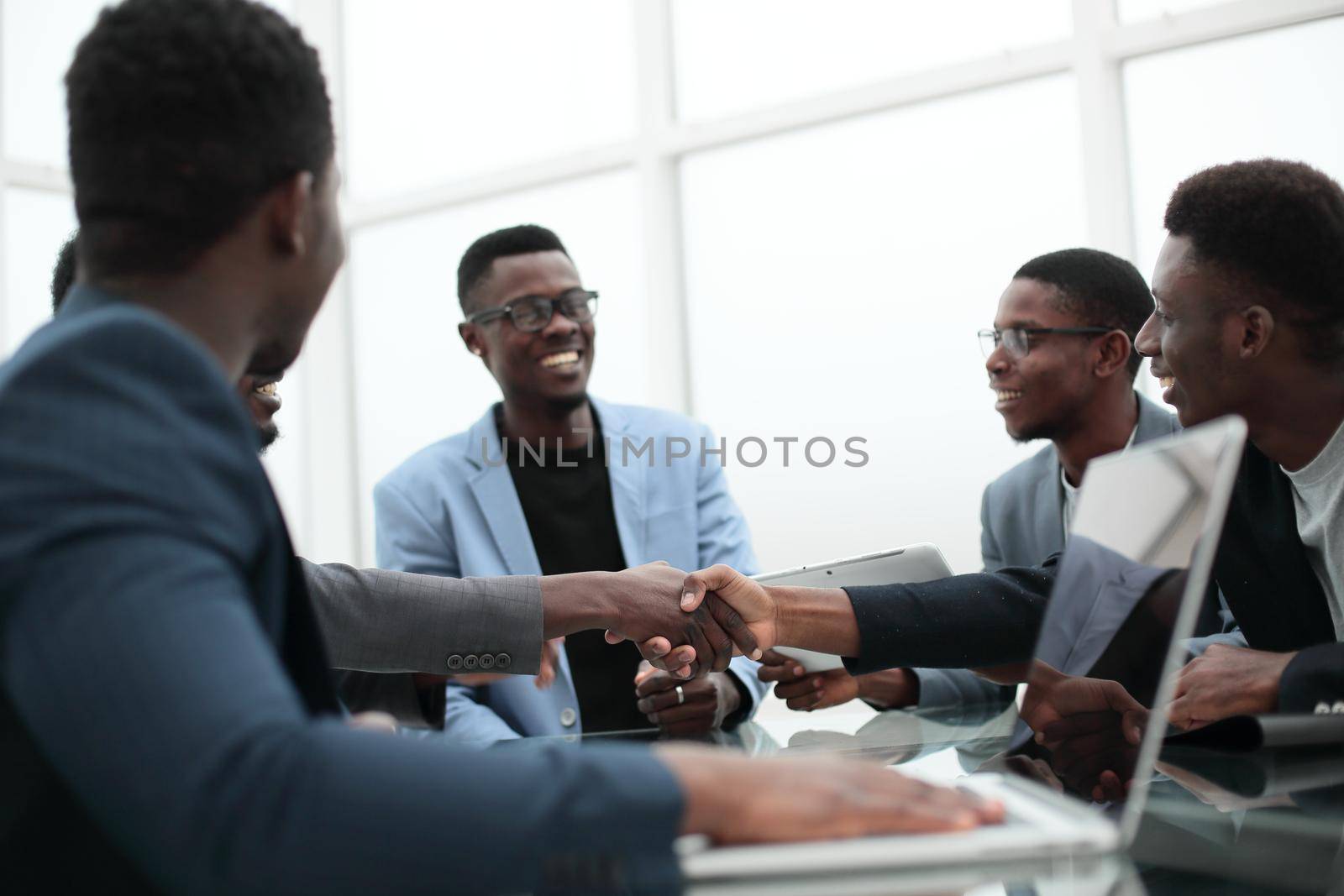 business colleagues greeting each other with a handshake. the concept of cooperation