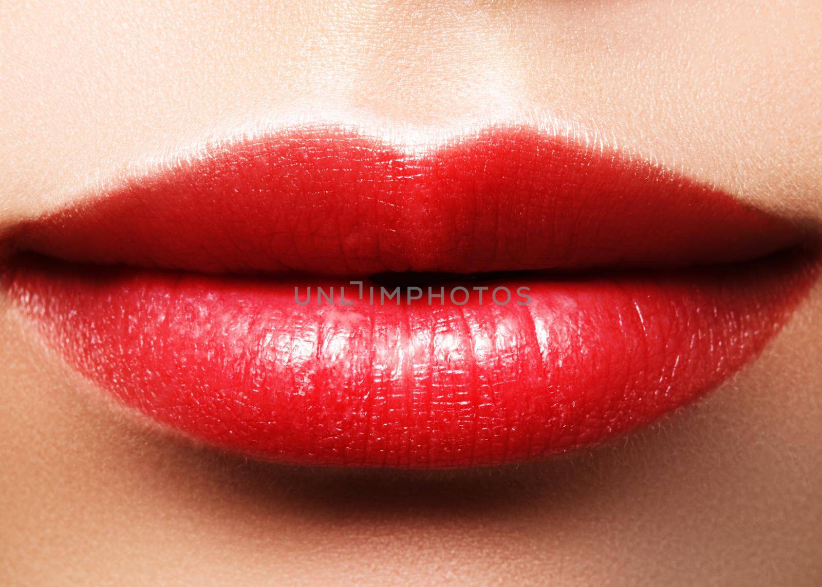 Sexy bright lips. Close-up Lips with juicy pink Make-up. Fashion magenta Makeup. Macro Beauty. Augmentation lips Treatment