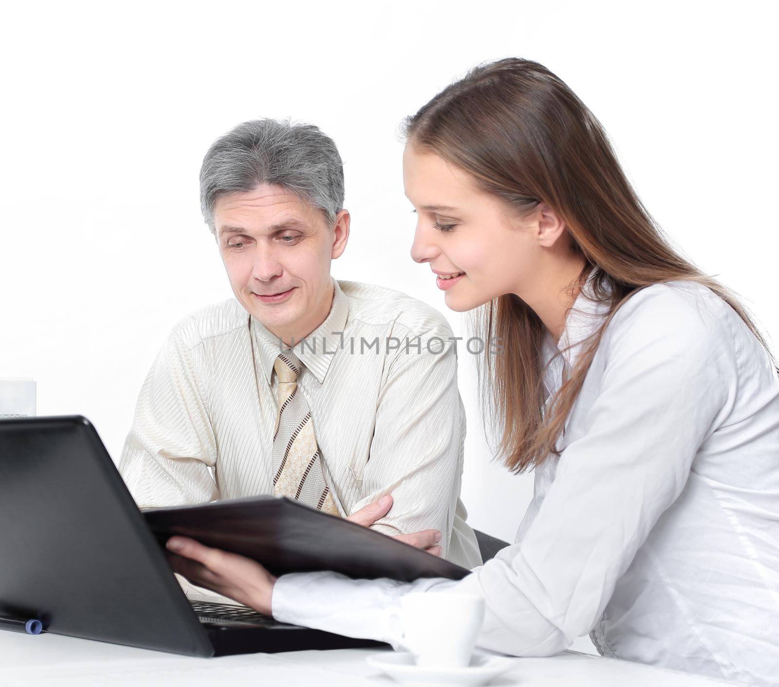 Manager and a young officer discussing financial records. by SmartPhotoLab