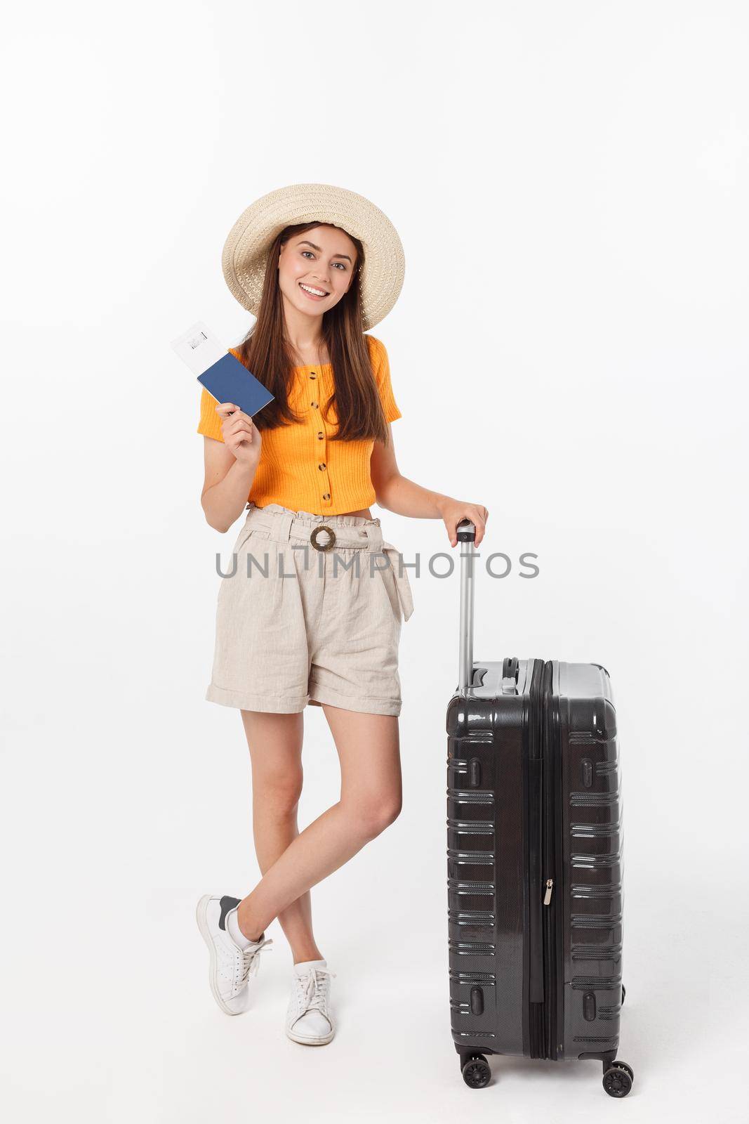 Full length of attractive young female in traveller casual with the travel bag, isolated on white background.