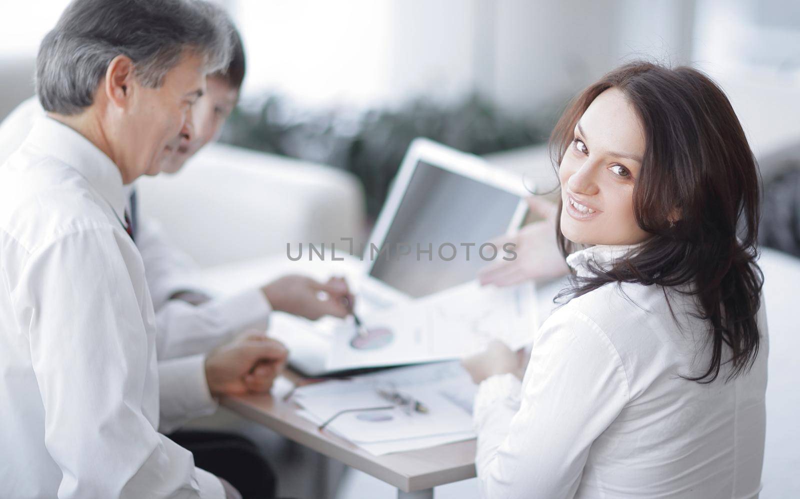 closeup. business team in the workplace in the office .the concept of teamwork