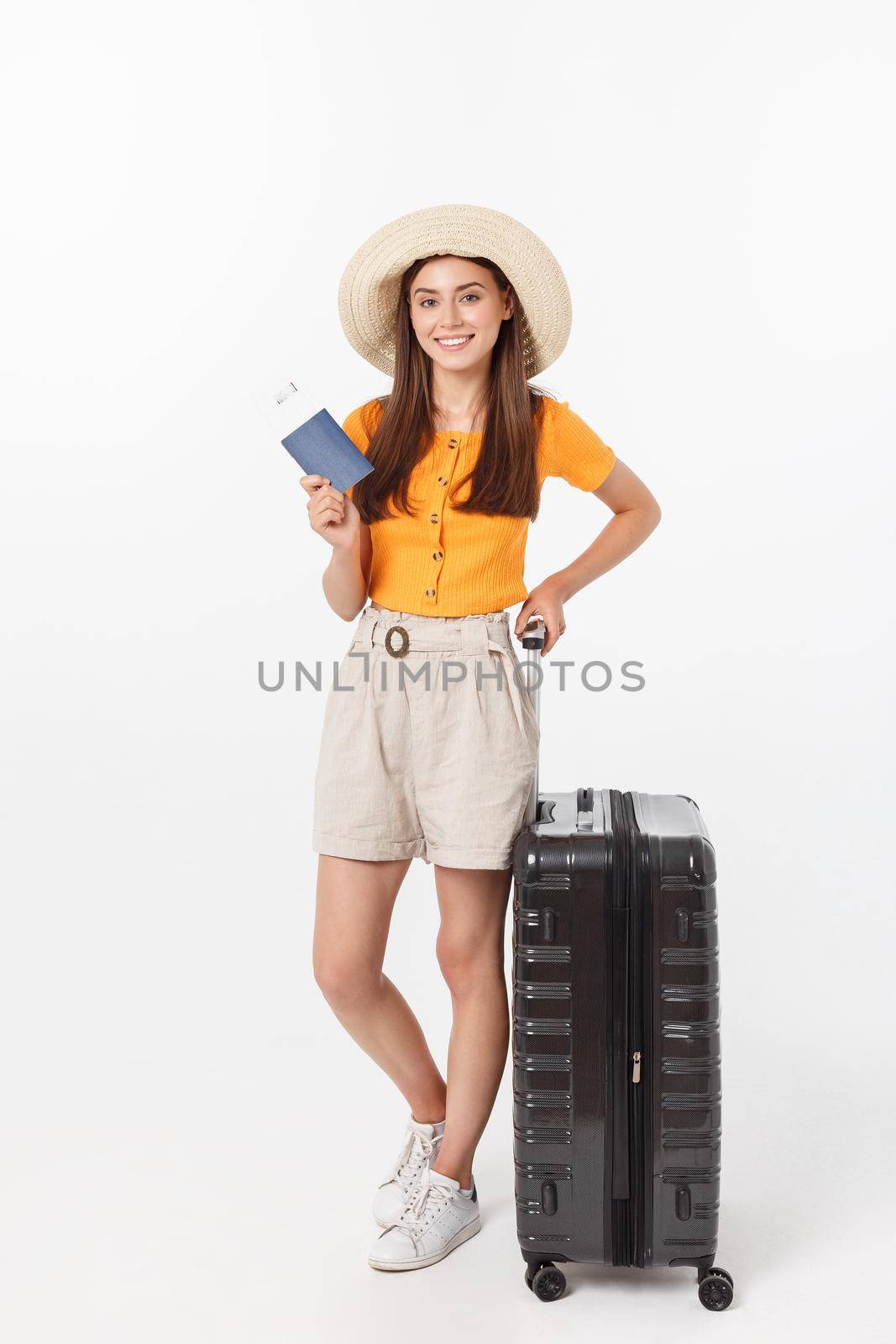 Full length of attractive young female in traveller casual with the travel bag, isolated on white background by Benzoix