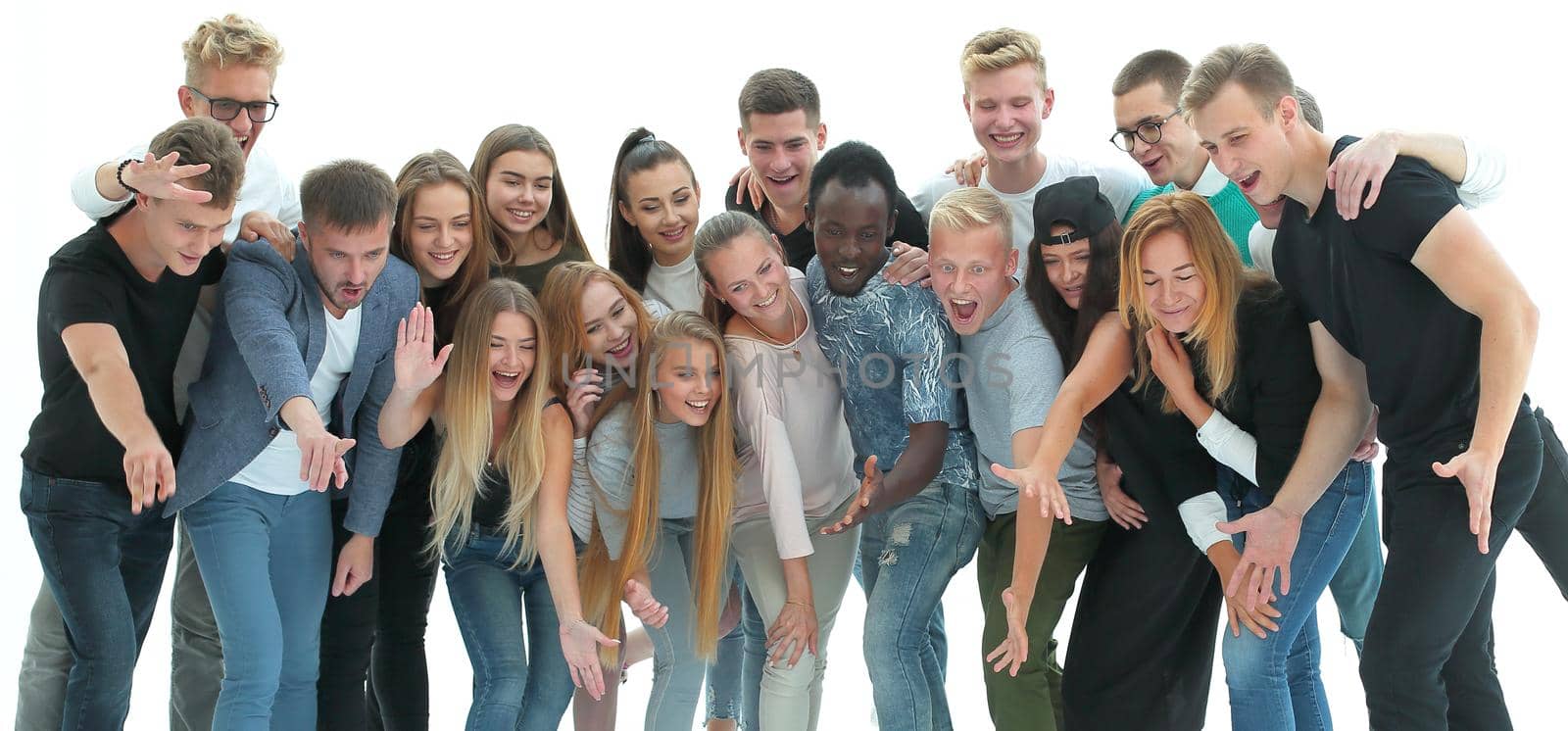 in full growth. a group of successful young people standing in a row. isolated on white