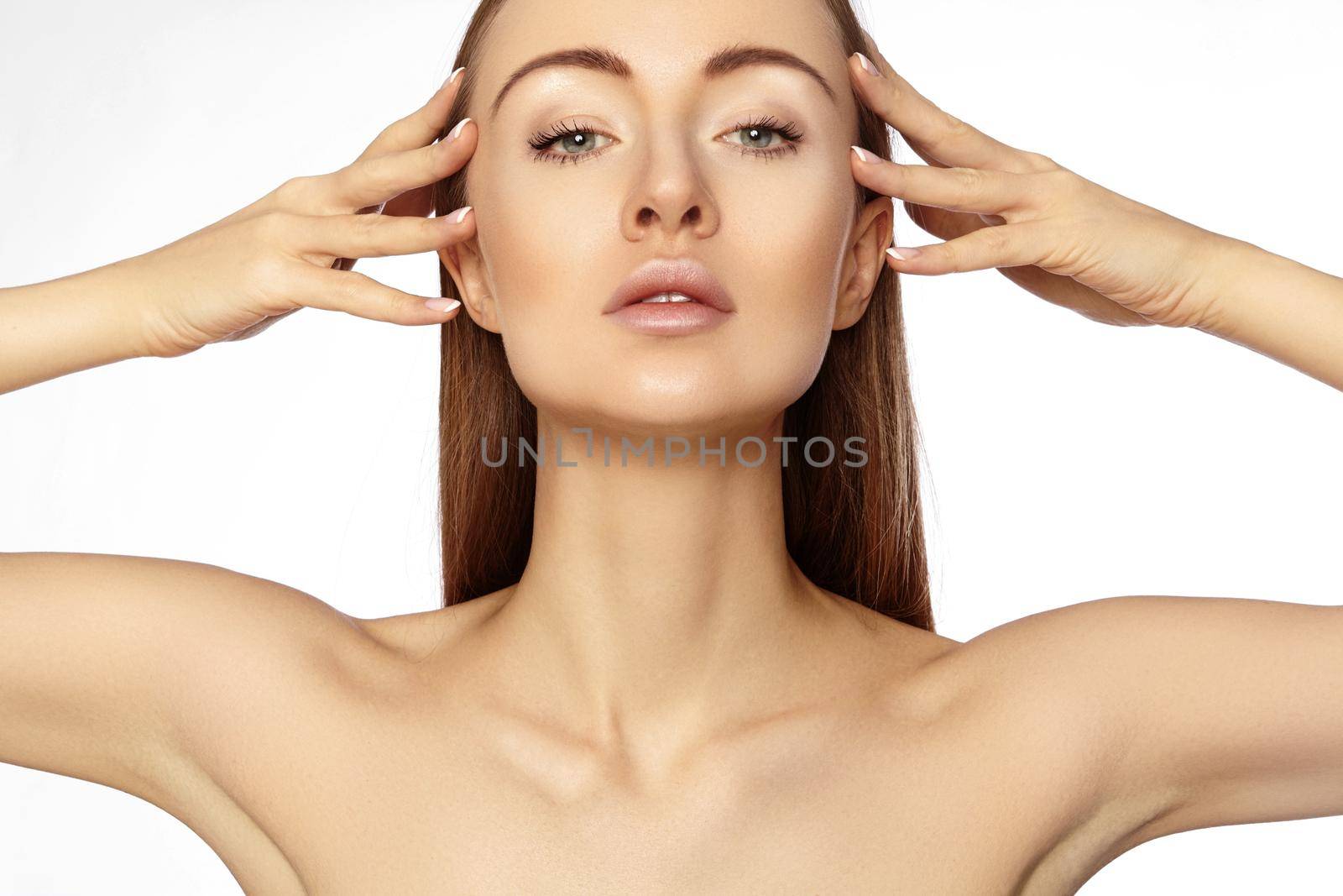 Portrait of beautiful woman with perfect clean skin. Spa look, Wellness and health Face. Daily Make-up. Skincare routine on white background