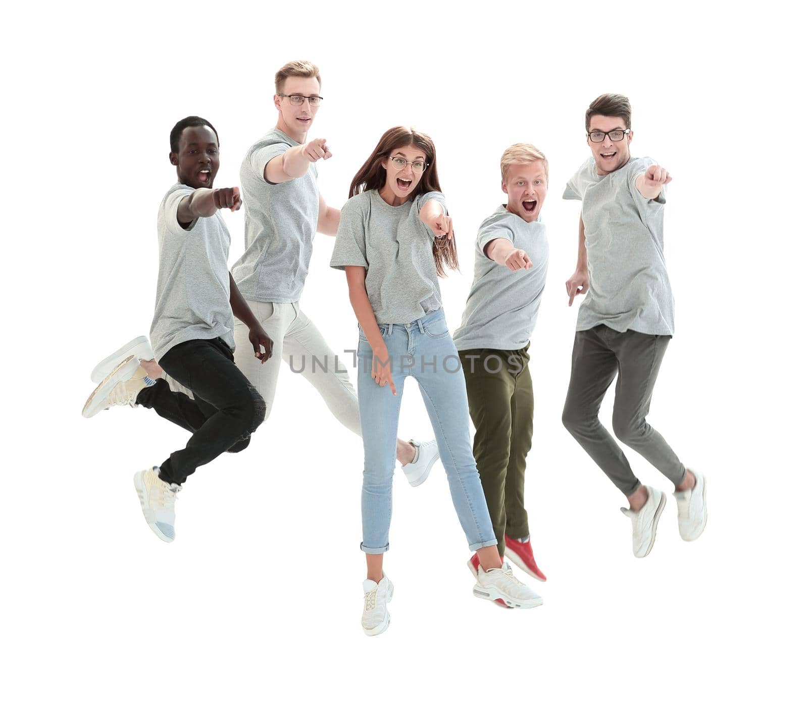 casual group of happy young people jumping isolated over a white background