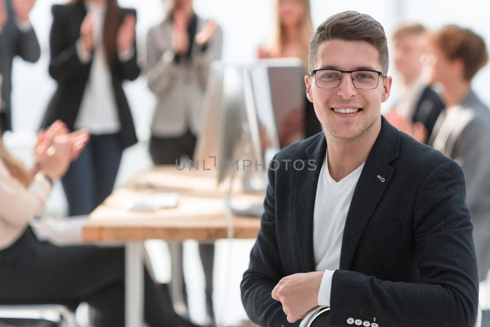 successful business man near the office Desk. the concept of teamwork