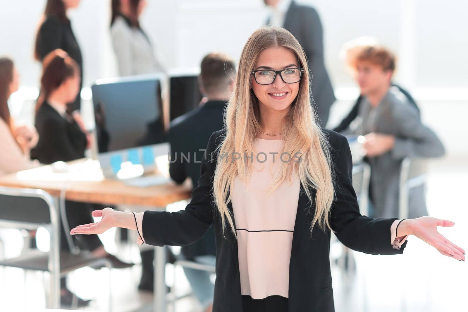 successful business woman standing in a modern office. business concept