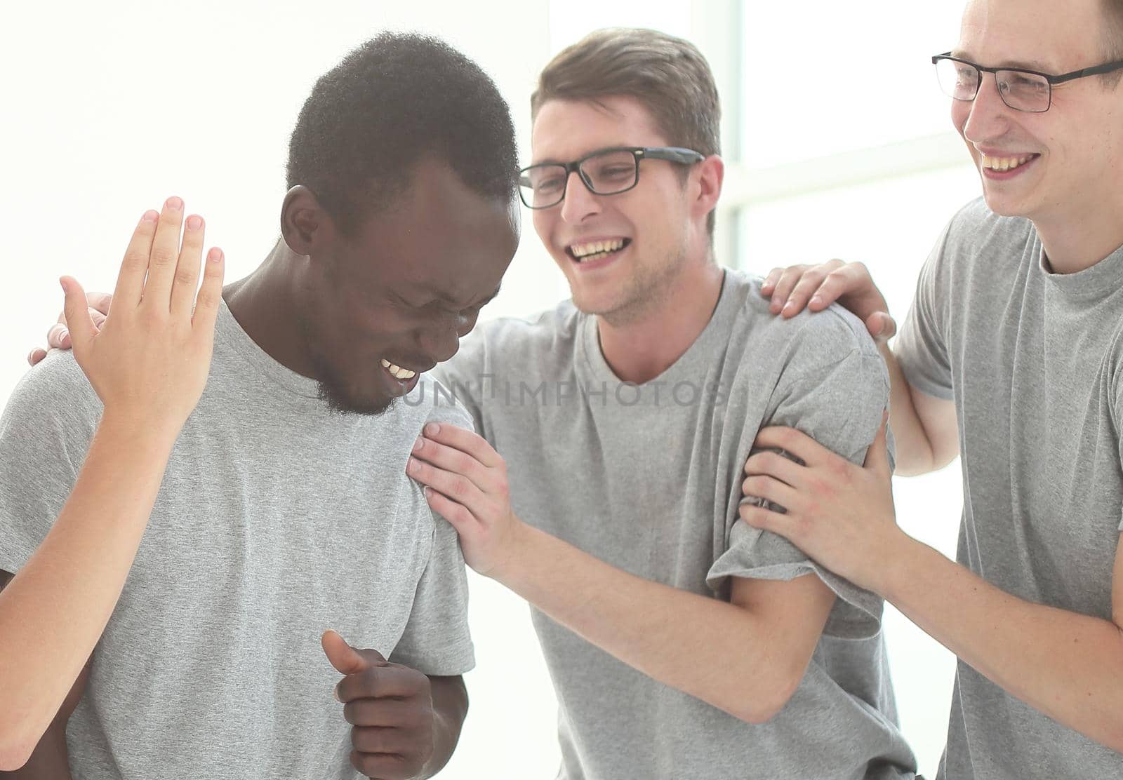 close up. a happy team of young people. photo with copy space