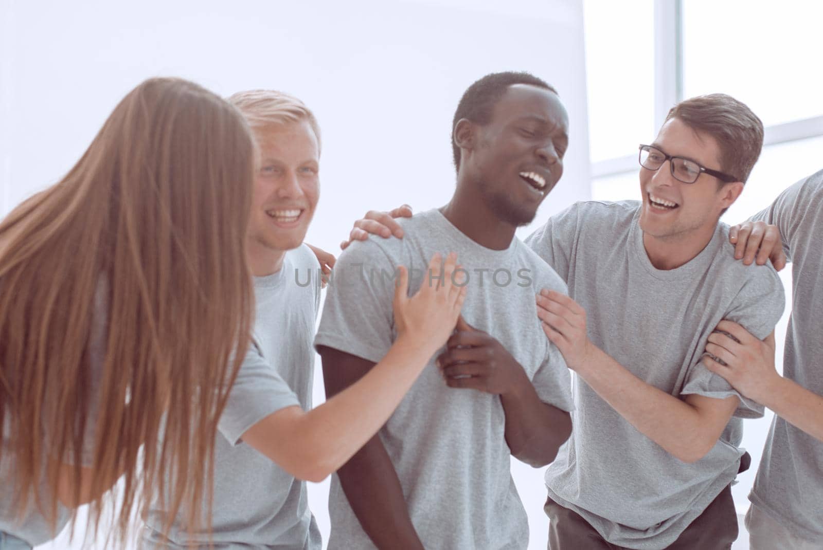 close up. a happy team of young people. photo with copy space