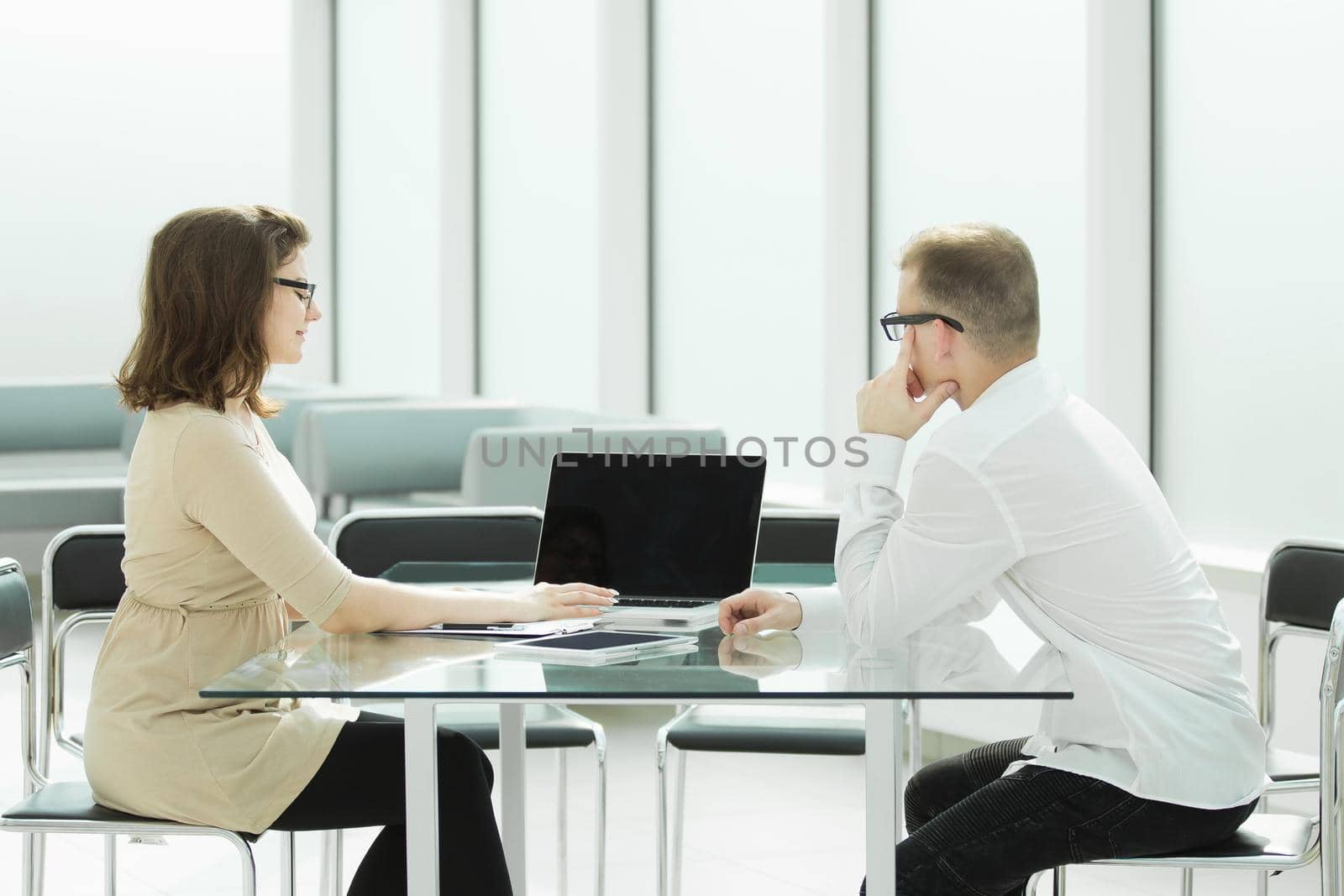 two employees sitting at the office Desk . office weekdays