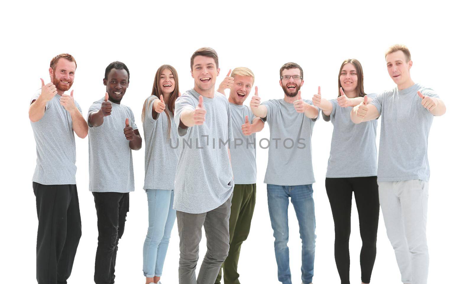 group of smiling young people showing thumbs up. photo with copy space