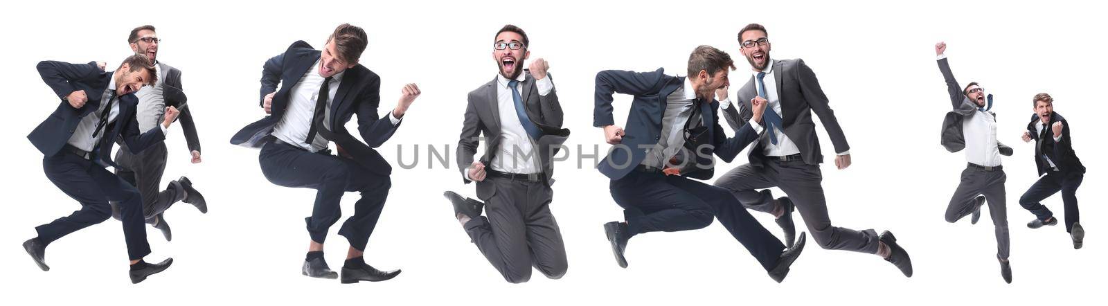 in full growth. two cheerful dancing business people. isolated on white background.