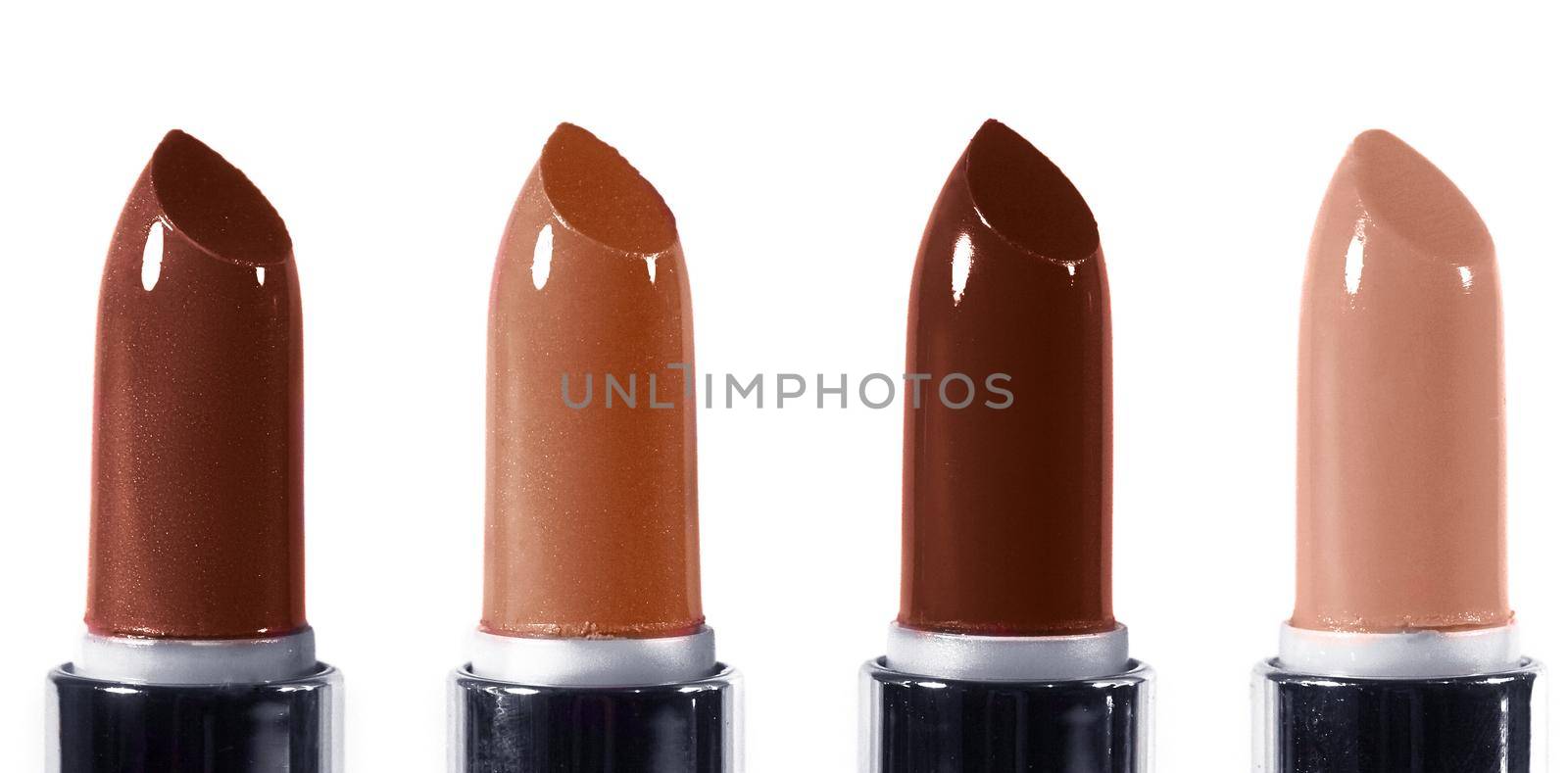 Beautiful lip makeup set. Horizontal macro shot with bright lipticks. Fashion lips make-up collection by MarinaFrost