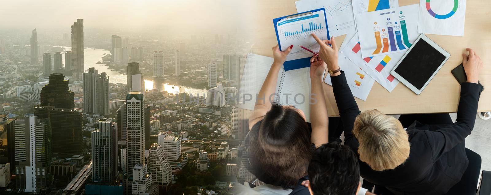 Business people group meeting shot from top widen view in office . Profession businesswomen, businessmen and office workers working in team conference with project planning document on meeting table .