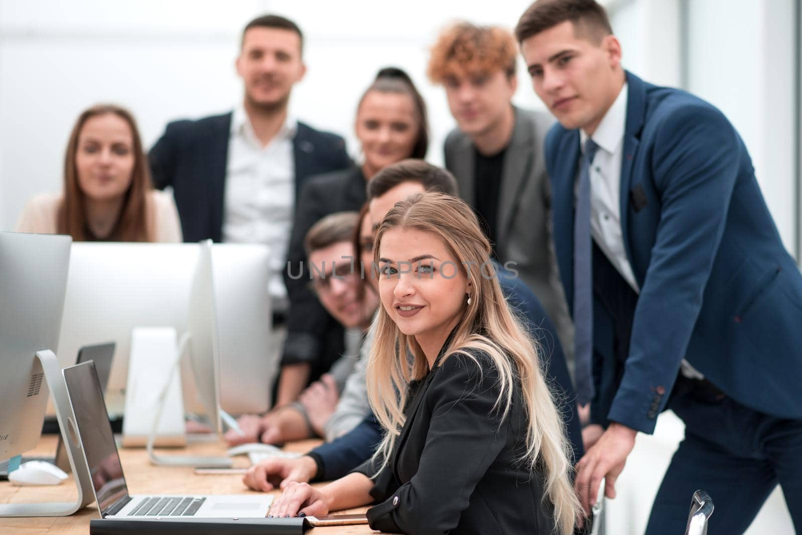 close up. team of young professionals near the desktop. teamwork