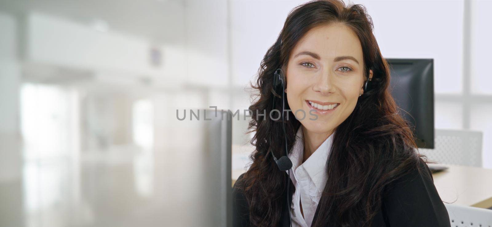 Business people wearing headset working in office to support remote customer or colleague. Call center, telemarketing, customer support agent provide service in broaden view .