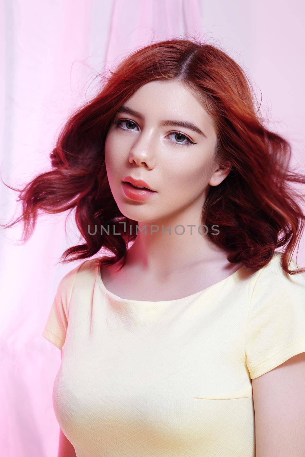 Romantic European Girl with Shiny Ginger Hair. Cute Tender Teenager Girl with Fresh Make-up, Curly Red Hair. Light Pink by MarinaFrost