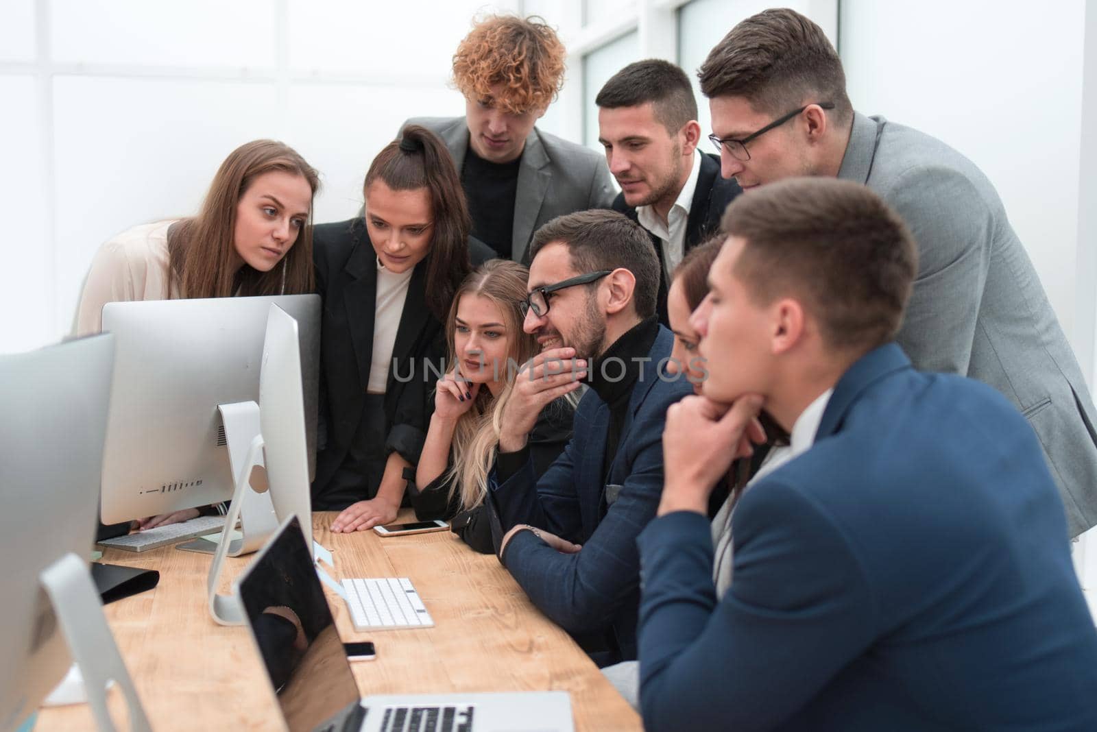 close up. exultant business team looking at the screen of the office computer