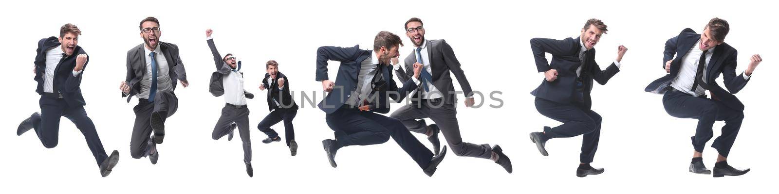 in full growth. two cheerful dancing business people. isolated on white background.